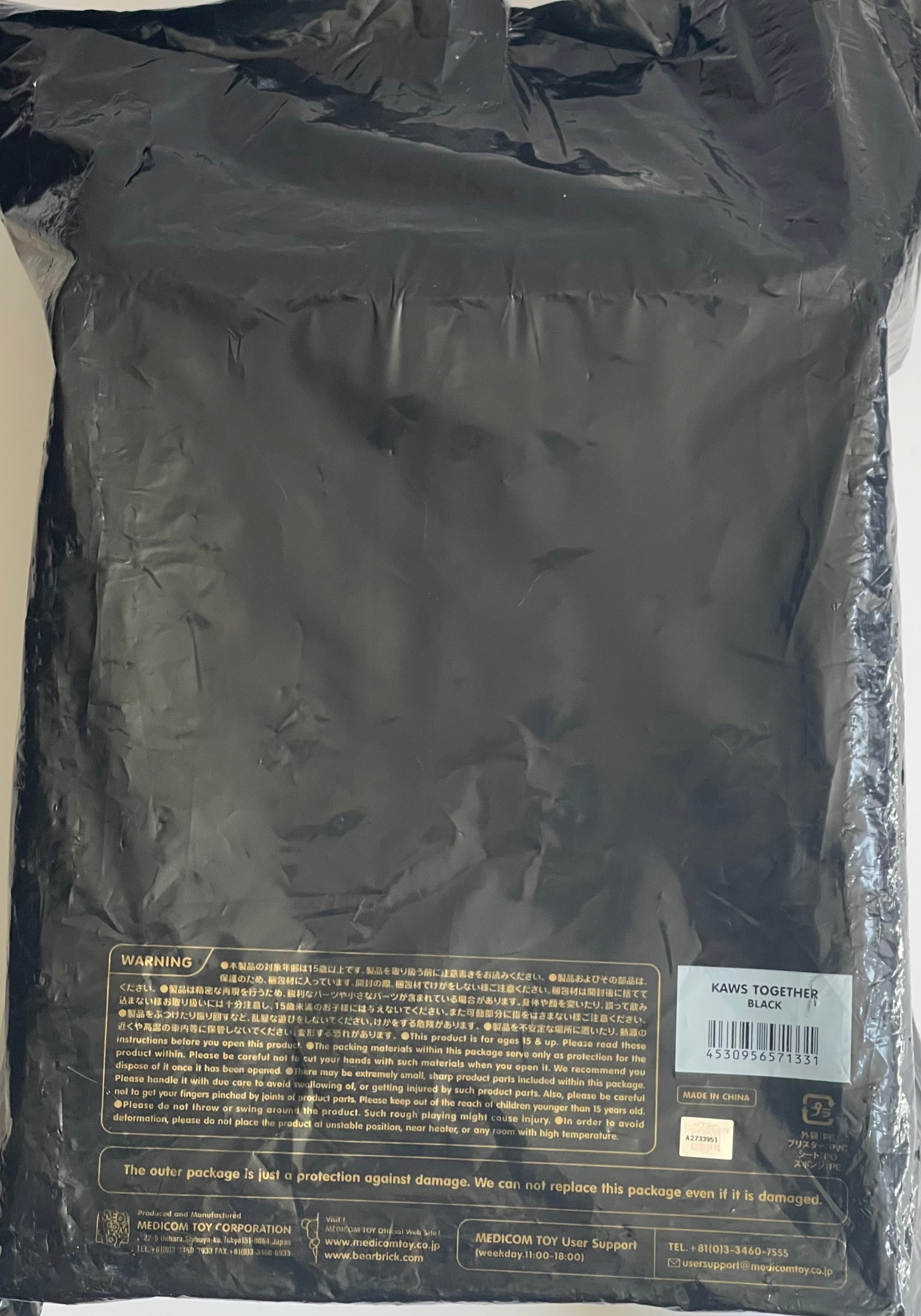 KAWS
Together (Blac), 2018
Painted vinyl multiple.
Fabricated by Medicom Toy
Contained in the original packaging
Printed signature stamped on the underside (feet) - see photographs
Stamped on the underside of foot from a sold out/out of print