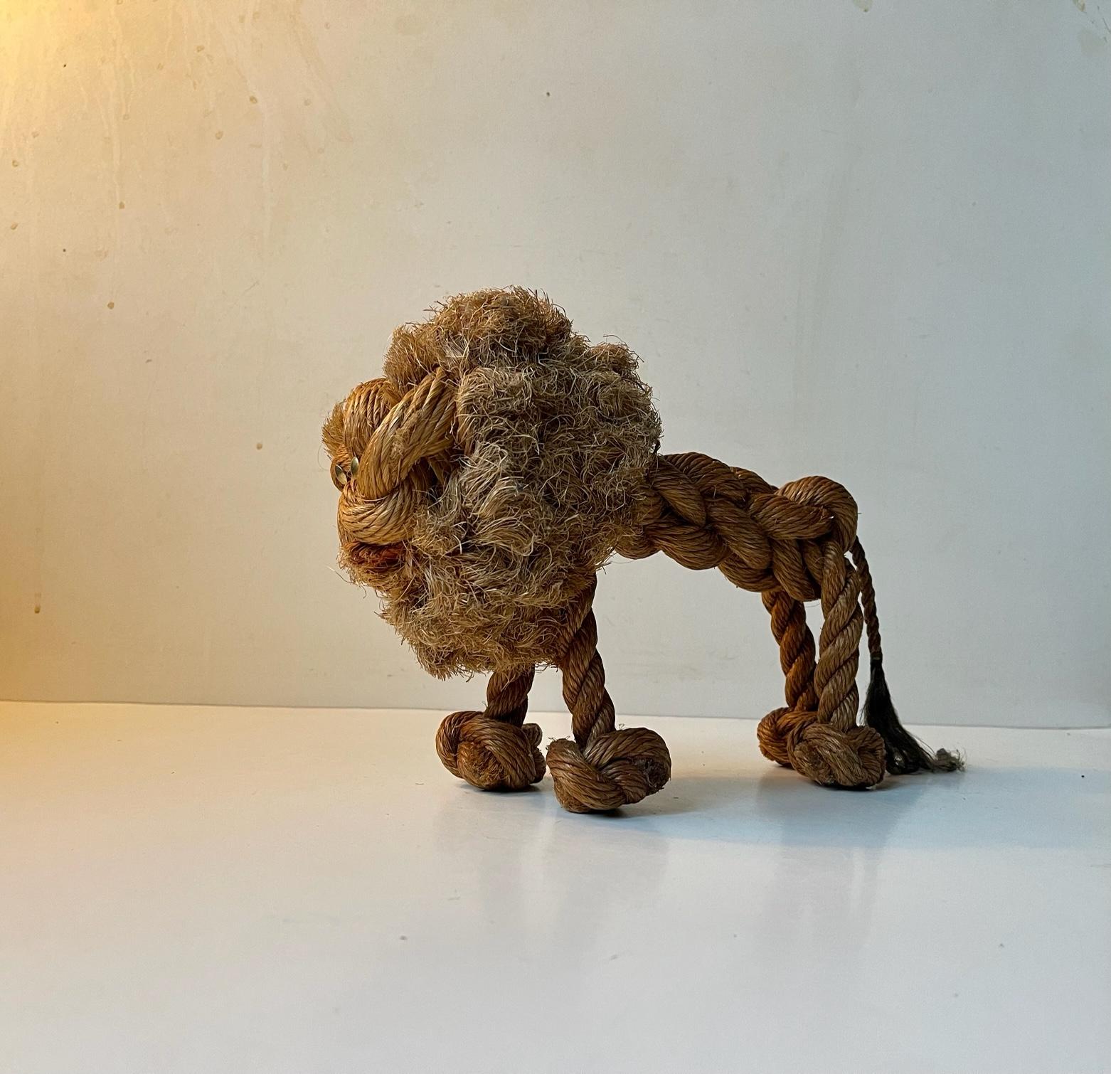 A rare example of the Danish toy-design-master Kay Bojesen work. This lion in braided natural rope was designed I collaboration between Jorgen Bloch and Kay Bojesen in latter part of the 1950s and it was discontinued in the catalogue after a few