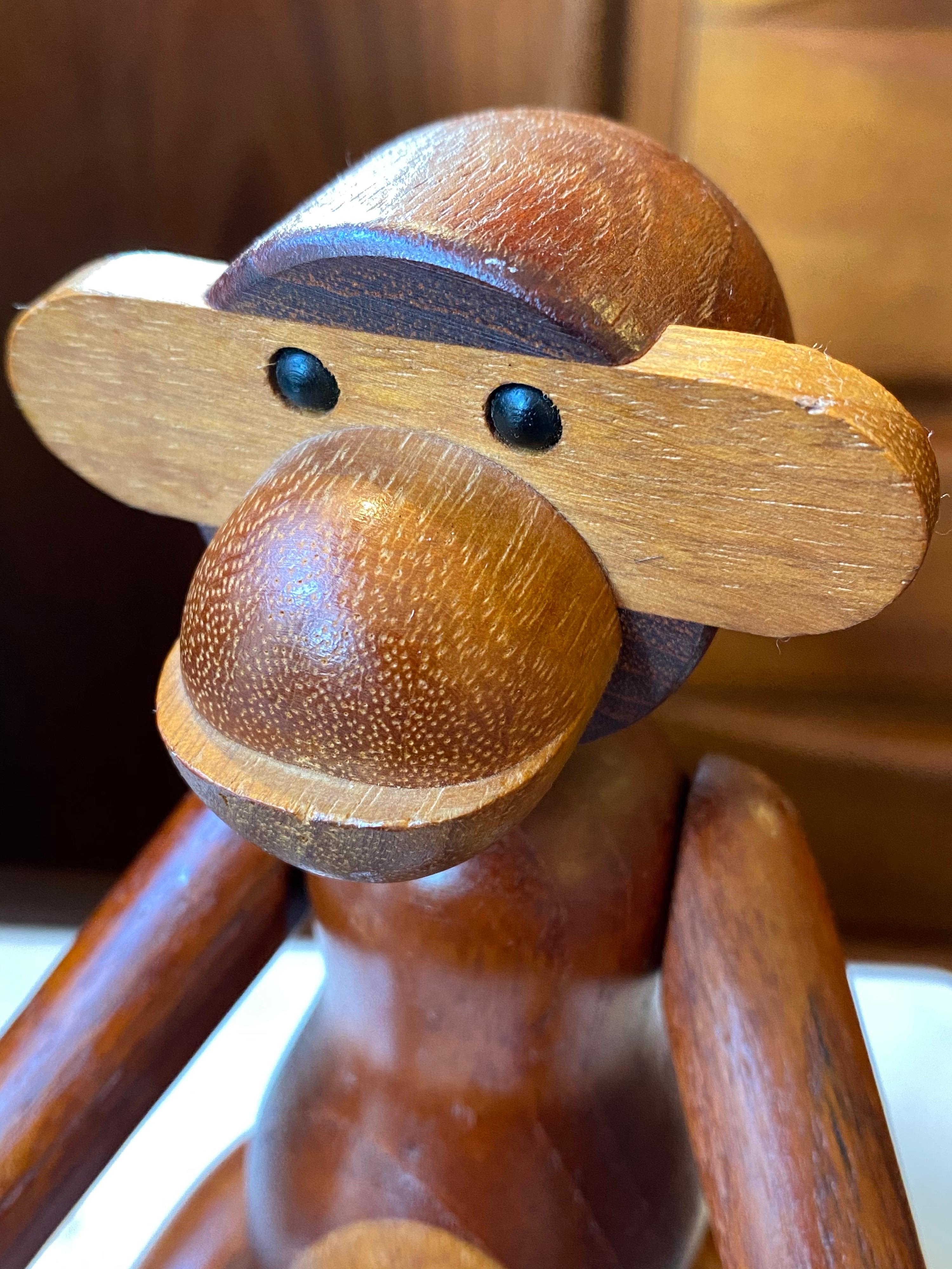Kay Bojesen articulated teak and limba wood monkey. Bought from the original owners, monkey dates to 1960. Very rich patina, new rubber joints installed! Ready for it's next 60 years! Signed on one foot.