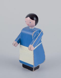 Kay Bojesen, Danish designer. Three early wooden farm house figures, mid-20th C.