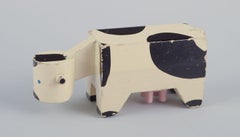 Kay Bojesen, Danish designer. Two early wooden figures of cows, mid-20th C.