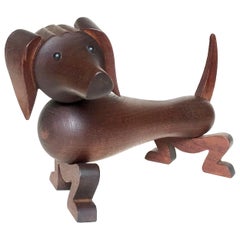 Bassotto danese moderno in teak di Kay Bojesen, anni '50