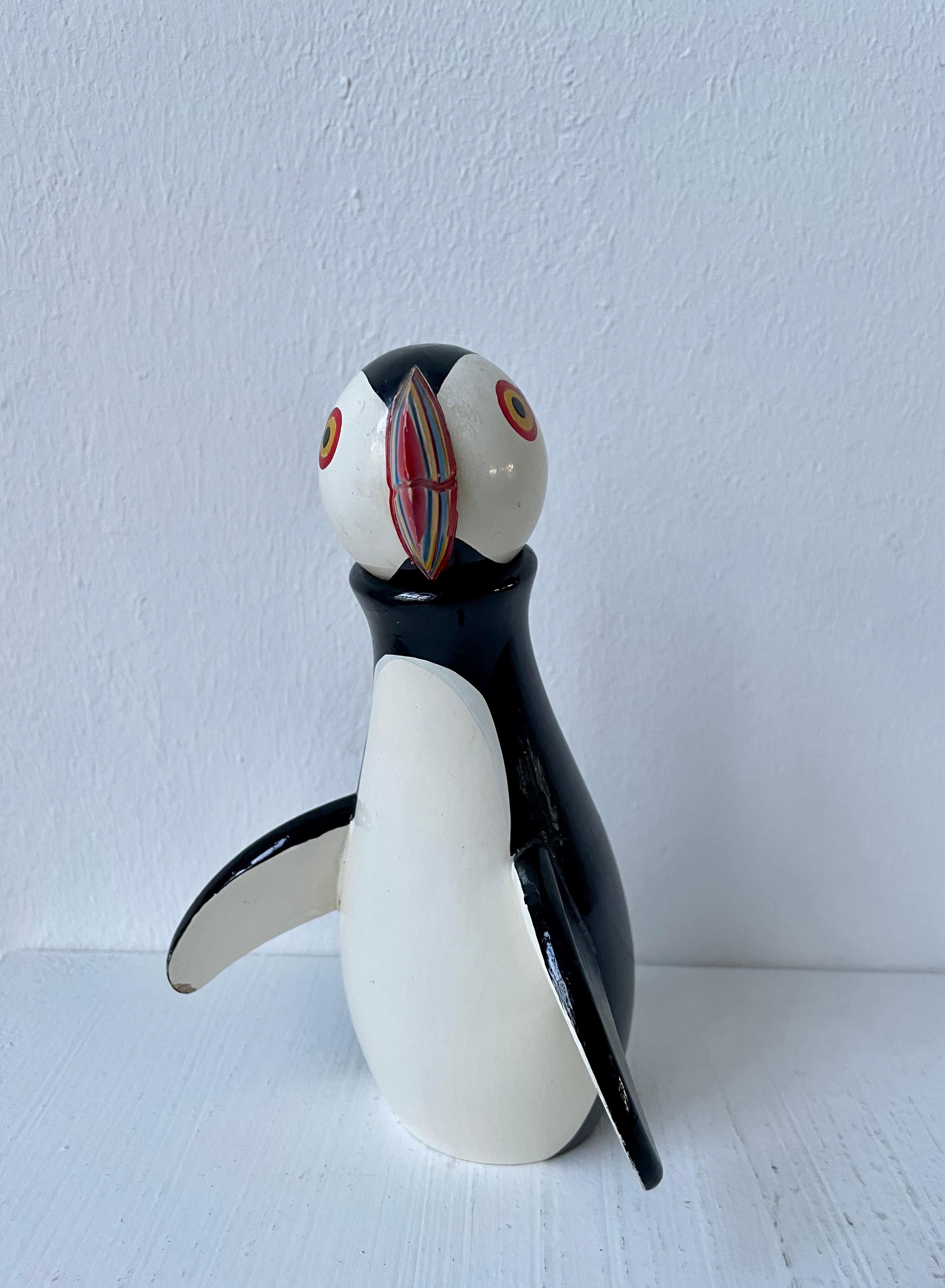 Vintage and early puffin designed by Kay Bojesen. It is marked with the old sticker: Kay Bojesen copyright Denmark.