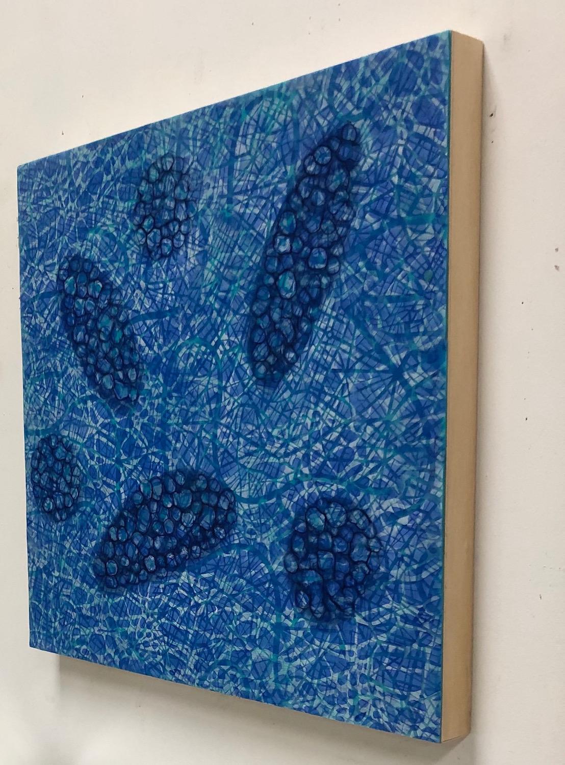 Kay Hartung’s “Bio Patterns 11” is a 20 x 20 x 1.5 inch encaustic painting composed of transparent layers depicting microscopic forms on a richly patterned background. In colors of blues, turquoise and white, the transparent layers create a sense of