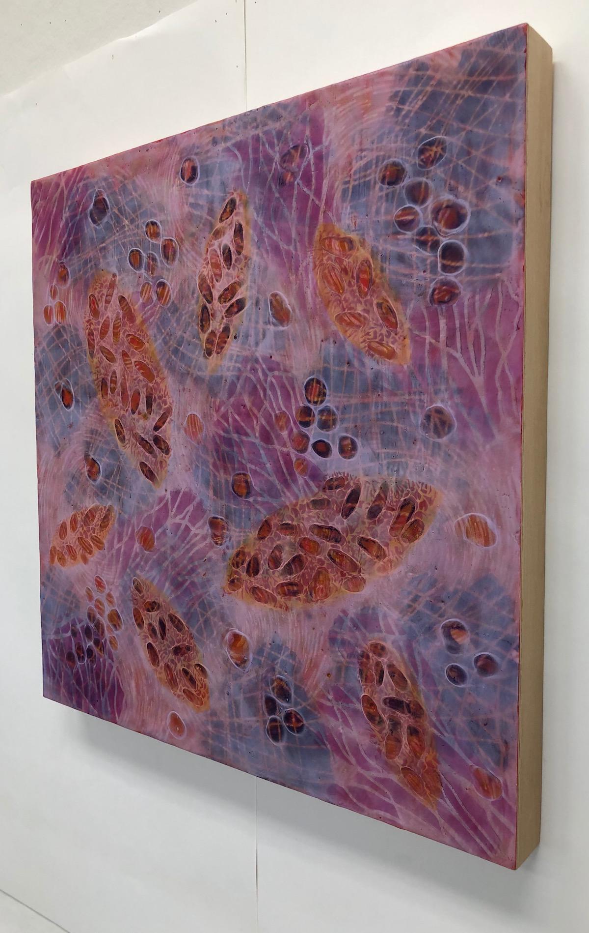 Kay Hartung’s “Bio Patterns 17” is a 20 x 20 x 1.5  inch encaustic painting composed of transparent layers depicting microscopic forms on a richly patterned background. In colors of pink, orange, purple and white, the transparent layers create a