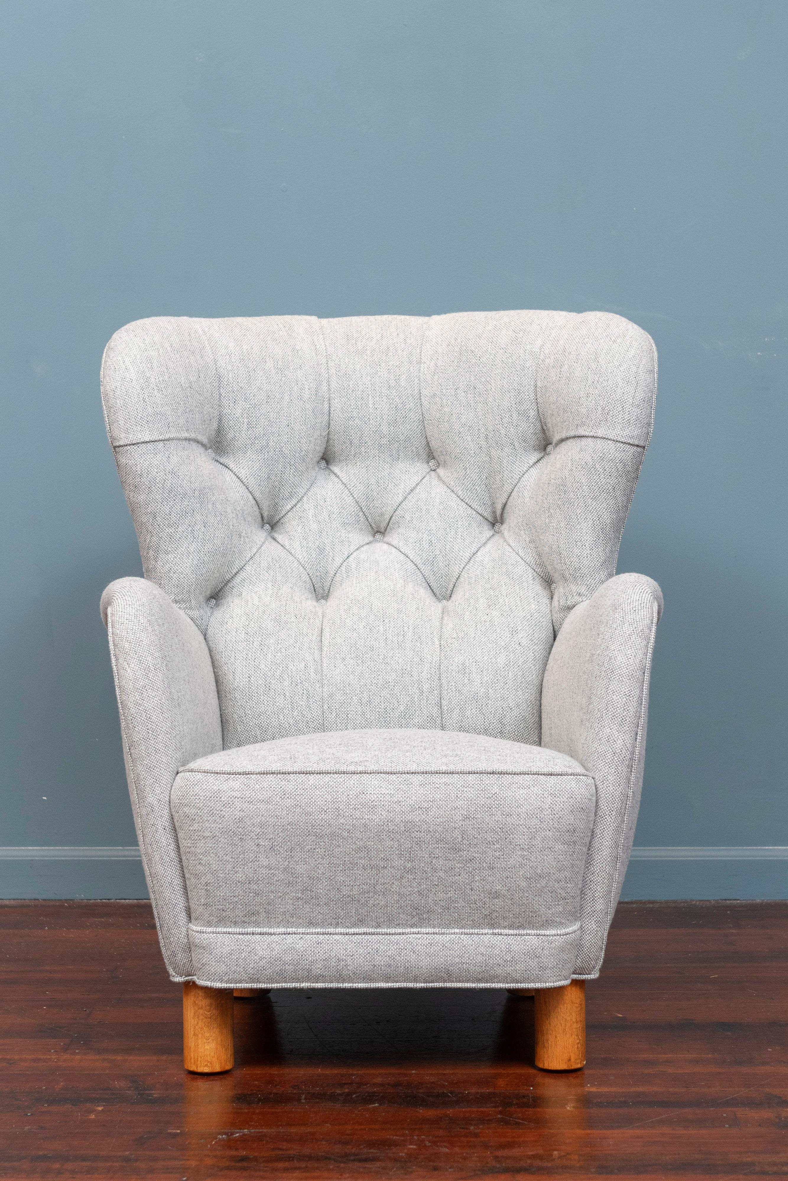 Kay Otto Fisker design wing chair, newly refinished and upholstered in Maharam Nanna Ditzel wool. A rare model chair executed with high quality construction and materials that wraps around you for a very comfortable sit. Perfect for reading or in