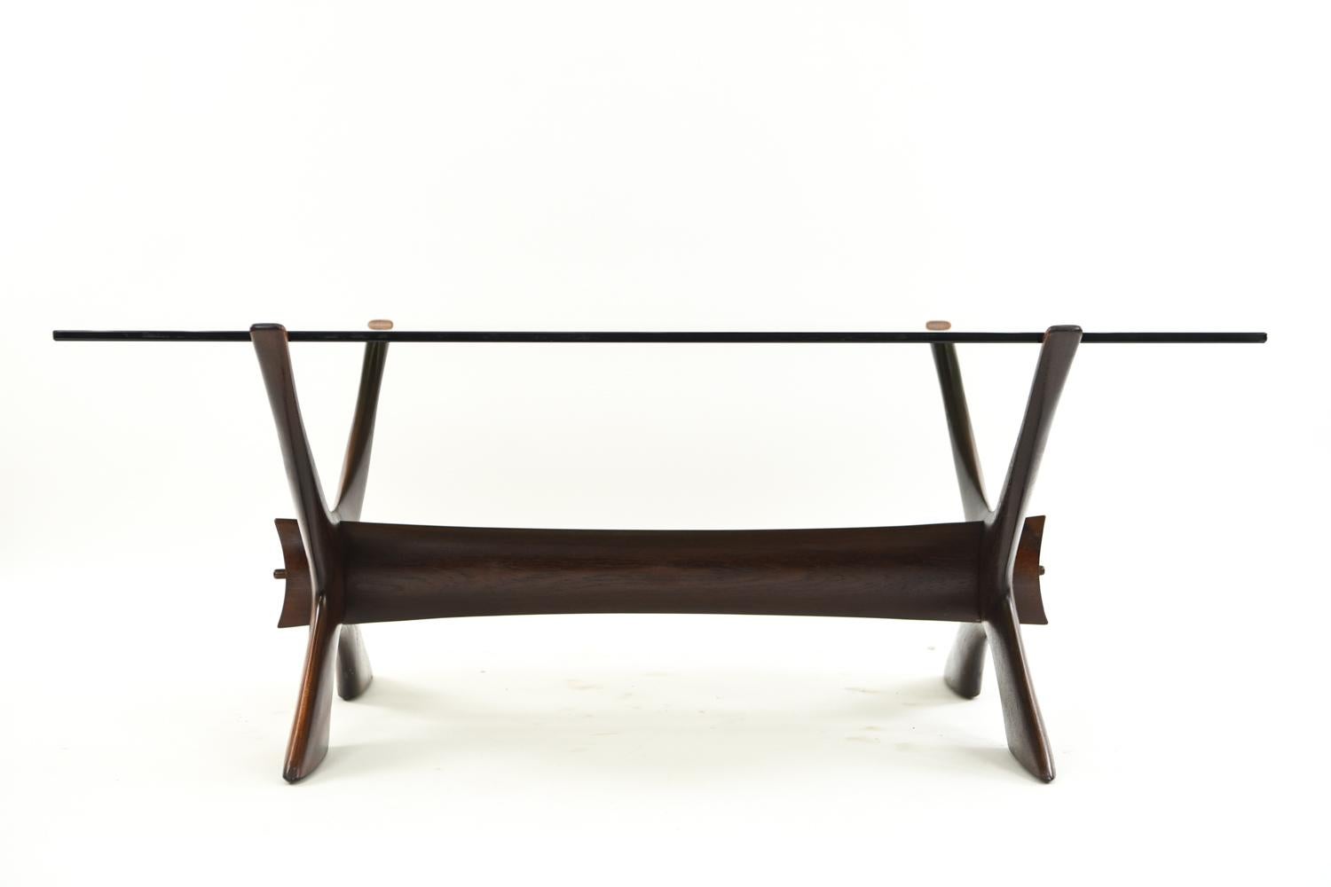 An oak base coffee table with a smoked glass top by Kayser Schriever.