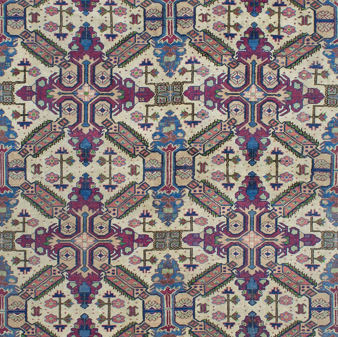 The town of Kayseri in central Turkey is known for producing rugs in traditional designs from other weaving centers. These rugs are woven primarily on cotton foundations with wool, mercerized cotton, or silk piles. This wool on cotton example