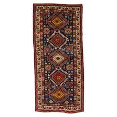  KAZAK ANTIQUE RUG from the late 19th century; 100 % Wool