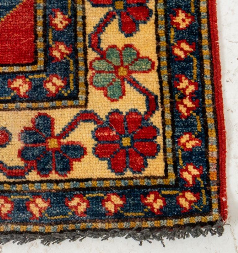 Kazak Geometric and Floral Wool Rug.

Dealer: S138XX