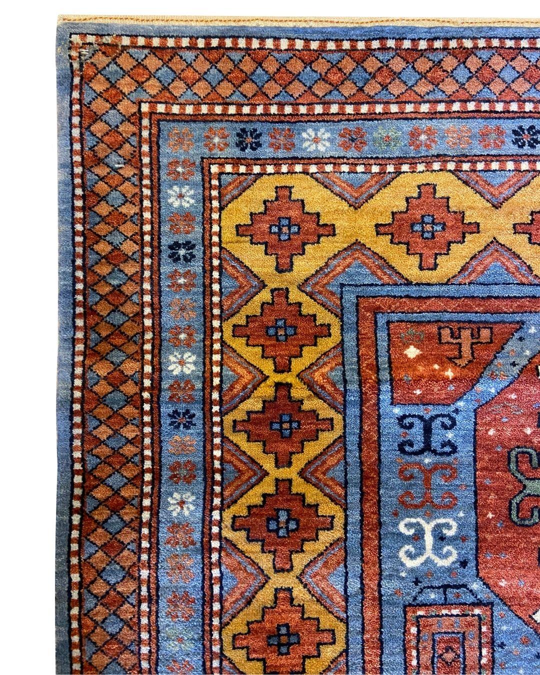 This Kazak-inspired tribal wool rug in red, blue, yellow, and cream, measuring 4' x 6', embodies the bold geometry and timeless artistry of the Caucasus region. The rich red and blue hues anchor the design, while golden yellow and soft cream accents
