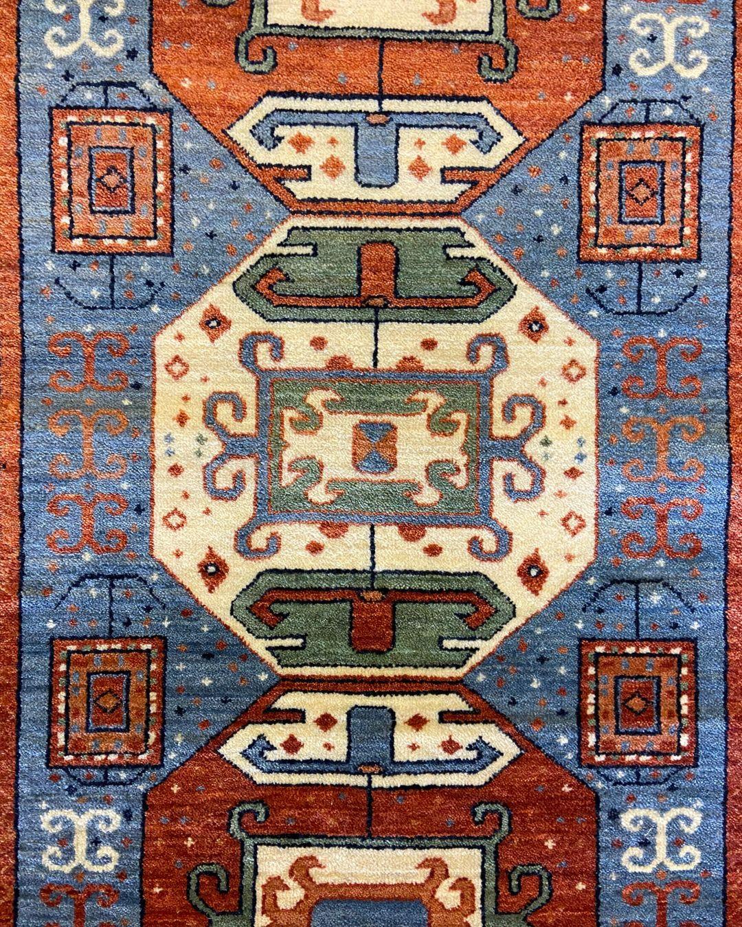Kazak-Inspired Tribal Wool Rug in Red, Blue, Yellow, and Cream, 4' x 6' In New Condition For Sale In New York, NY
