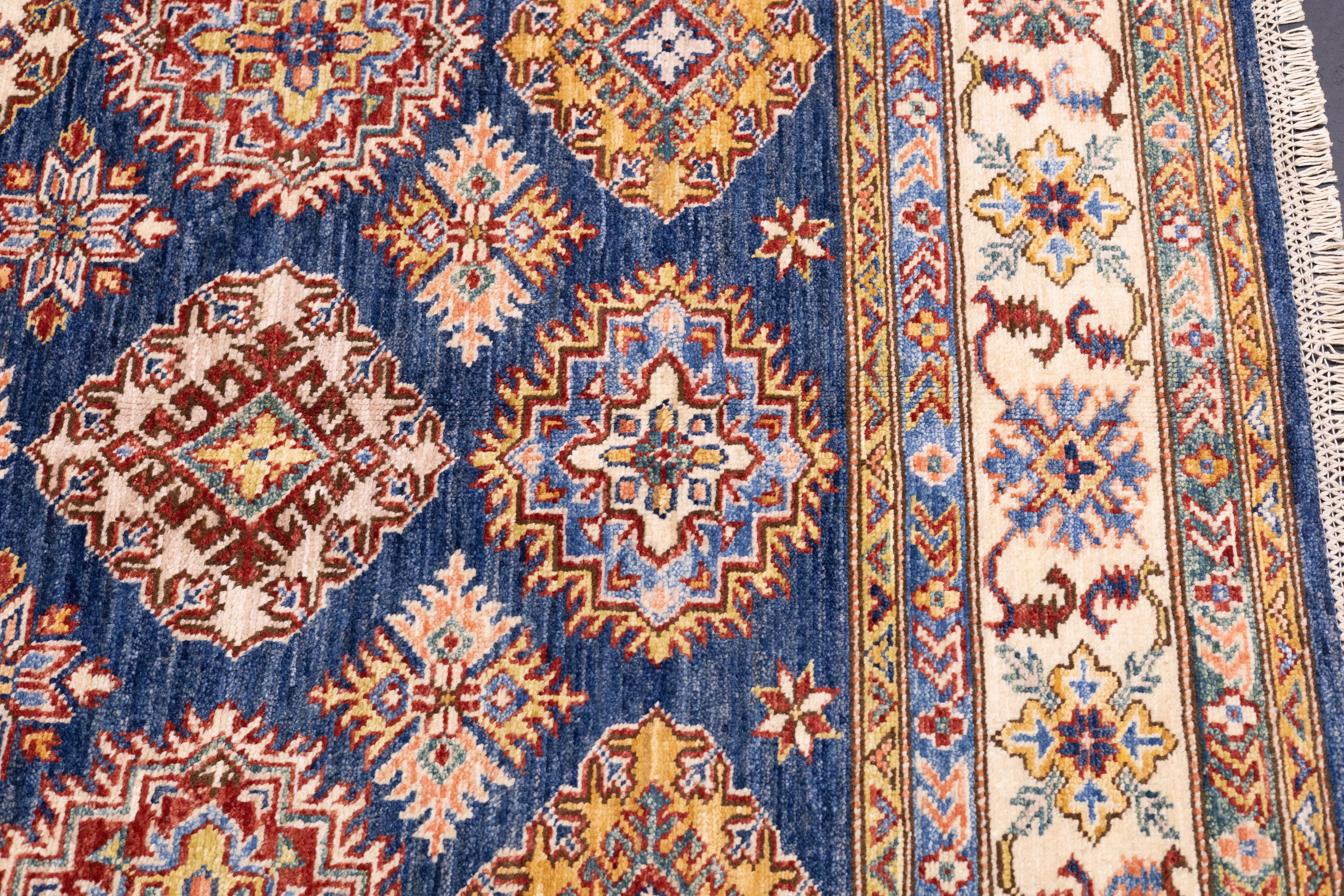 Alfombra Kazak 4'11'' x 7'1'' Lana en venta