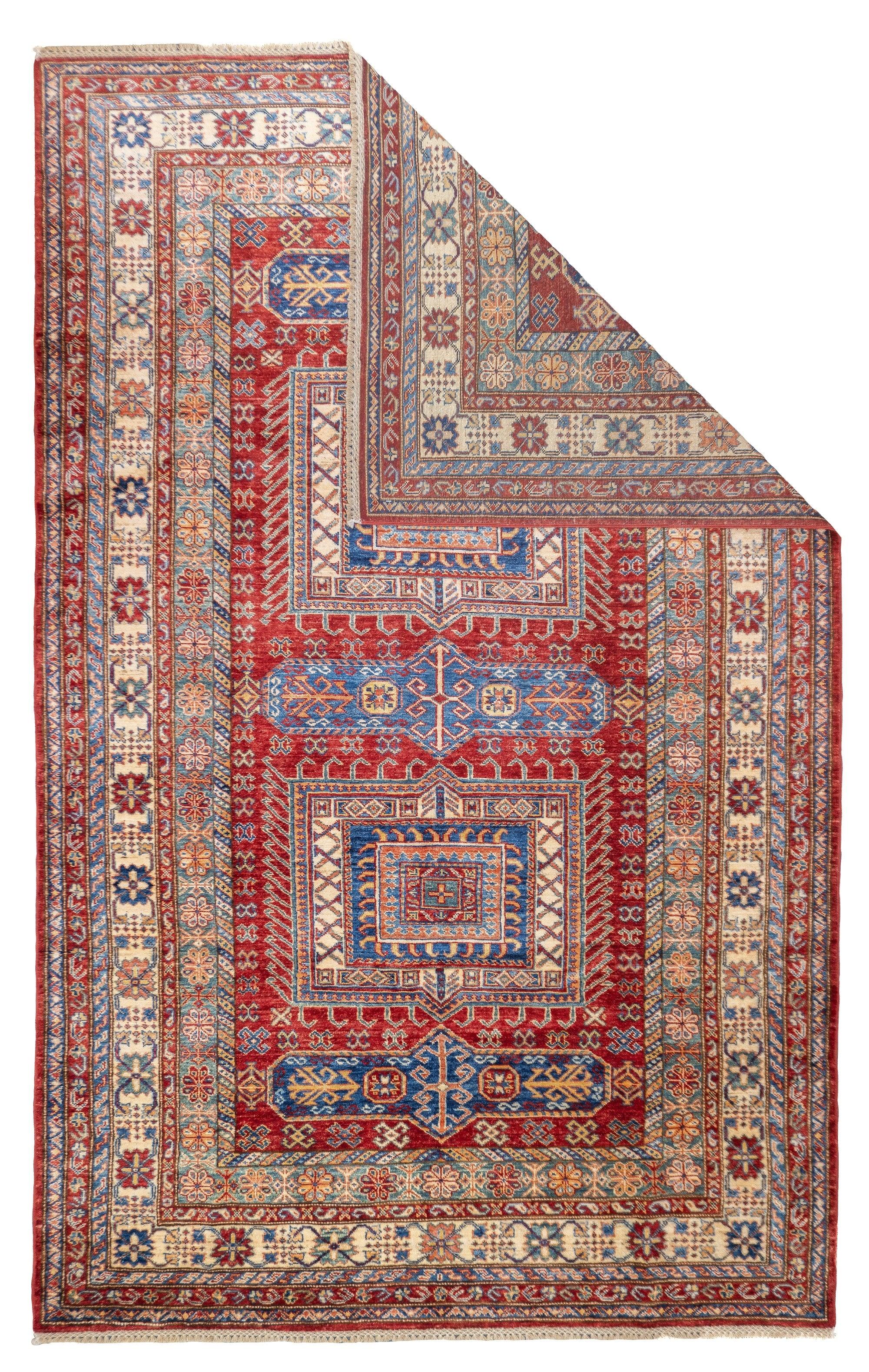 Kazak Rug 5'10'' x 9'2''. SW Caucasus/Armenia. Boldly patterned, strongly coloured, totally geometric, all wool, coarse to moderate weave, medium to long pile, scatter format pieces, in medallion, allover and prayer (directional) layouts, with