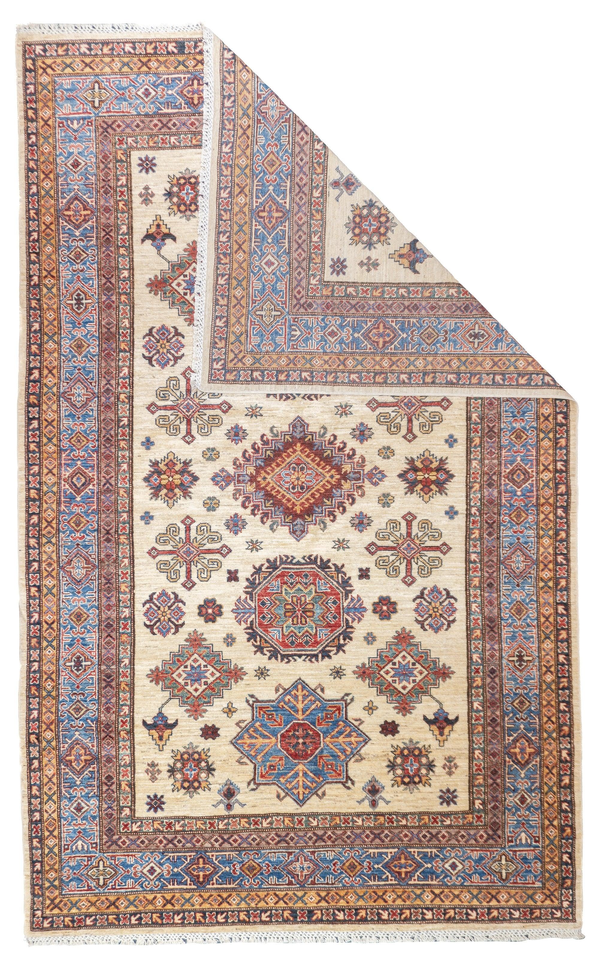 Kazak Rug 5'7'' x 9'1''. SW Caucasus/Armenia. Boldly patterned, strongly coloured, totally geometric, all wool, coarse to moderate weave, medium to long pile, scatter format pieces, in medallion, allover and prayer (directional) layouts, with