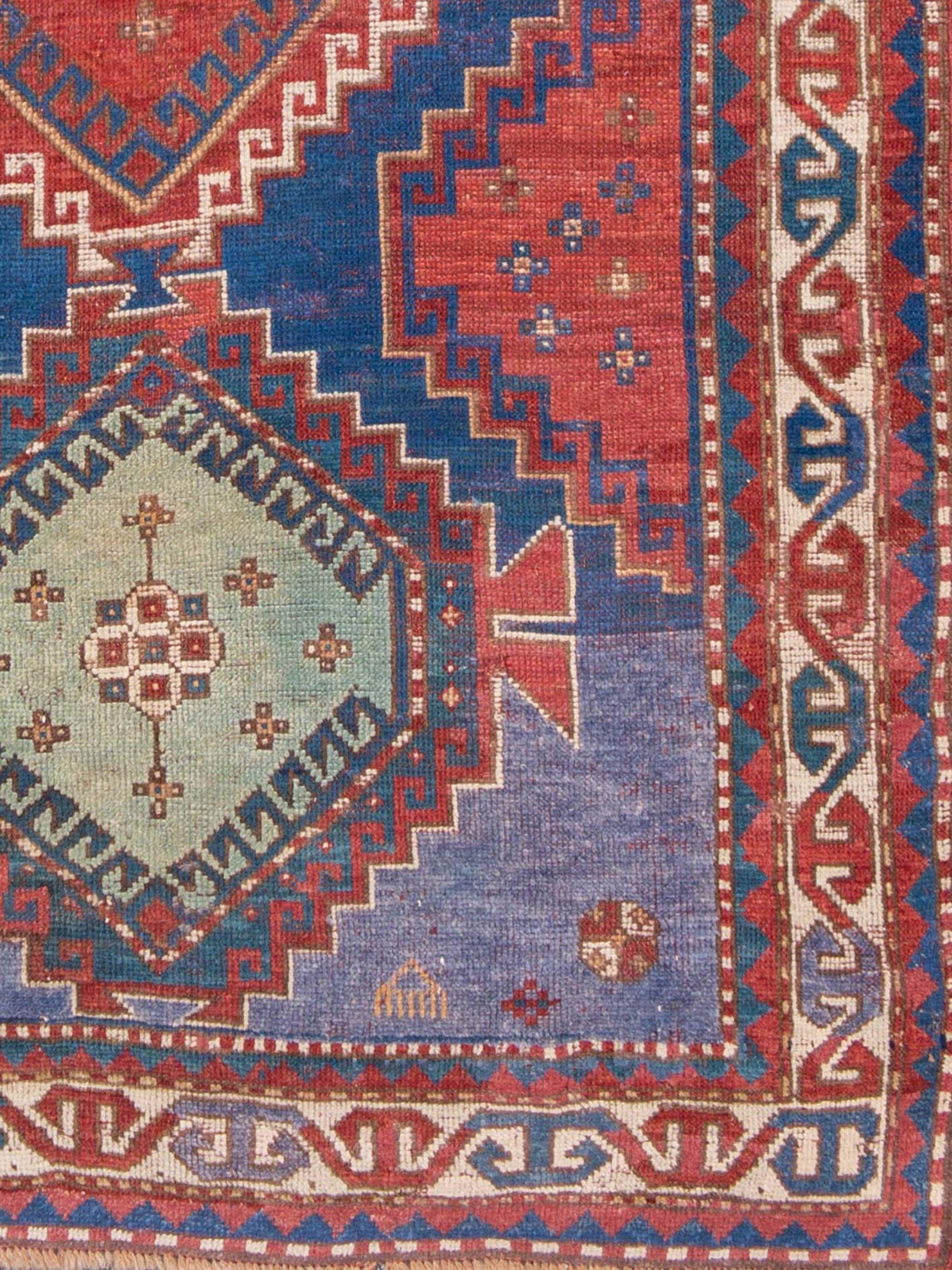Alfombra kazaka, c. 1900 Anudado a mano en venta