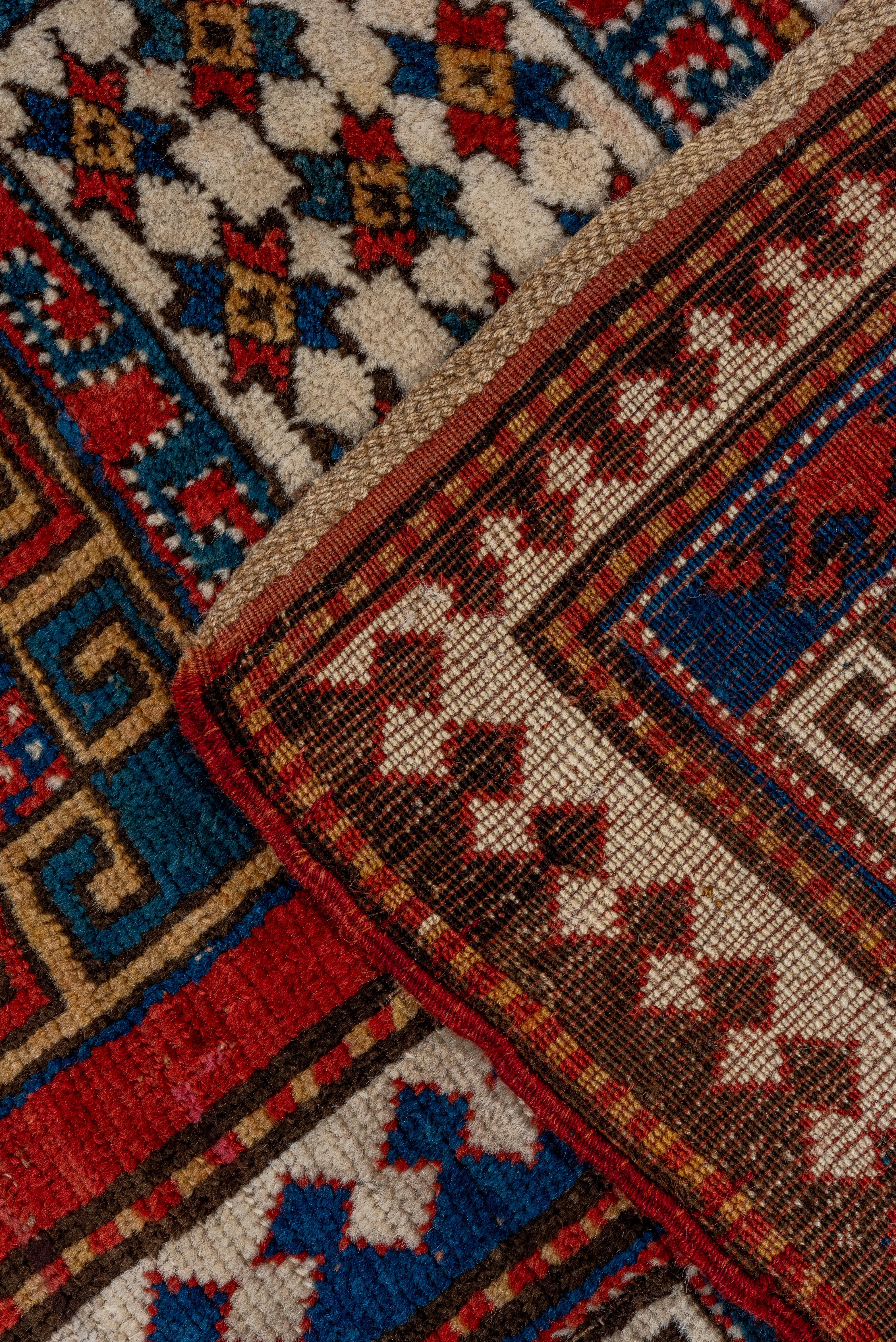 20th Century Kazak Rug Octagon Medallion and Geometric Panel Design For Sale