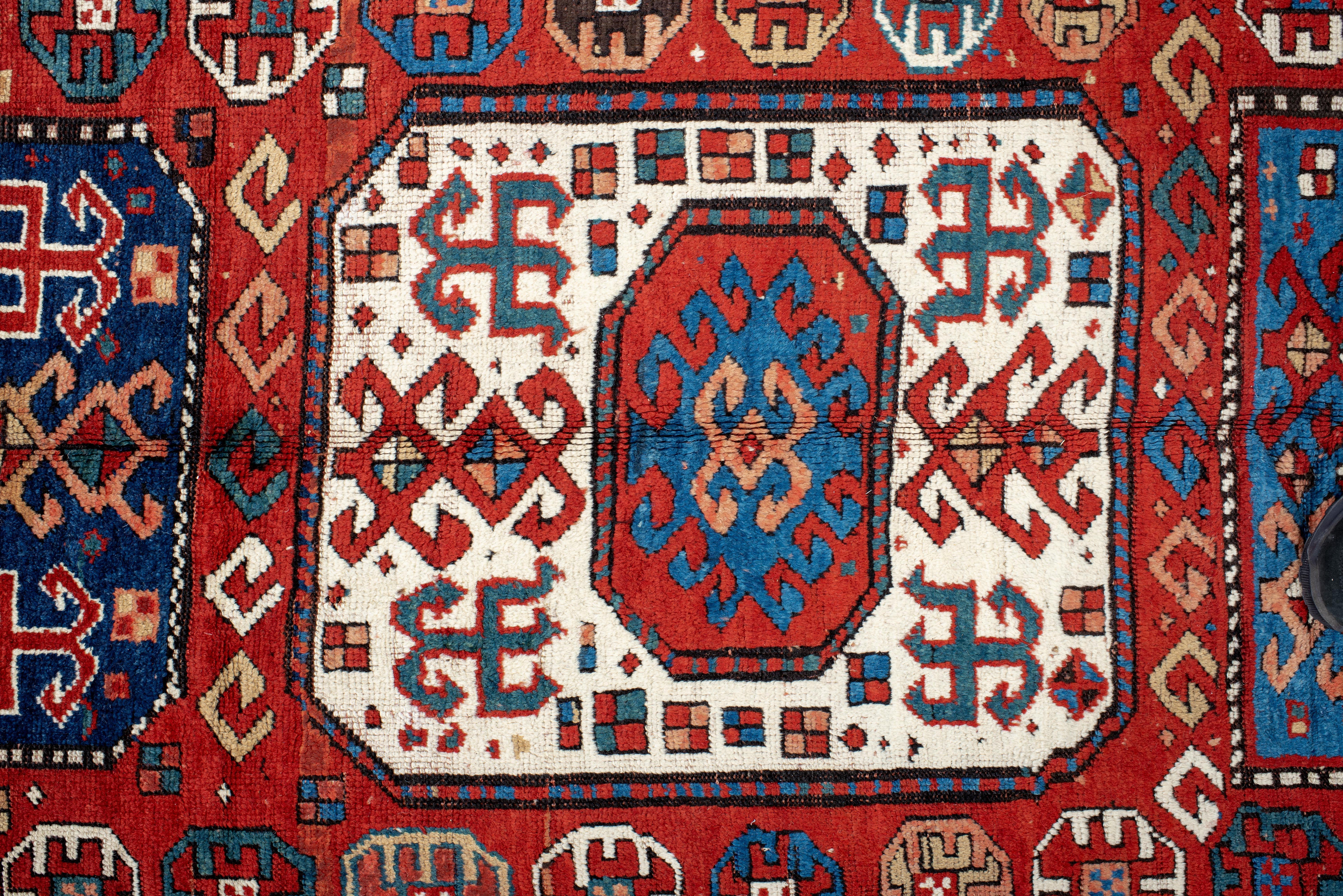 Kazak Rug Tribal Medallion and Hooked Motif Design For Sale 1