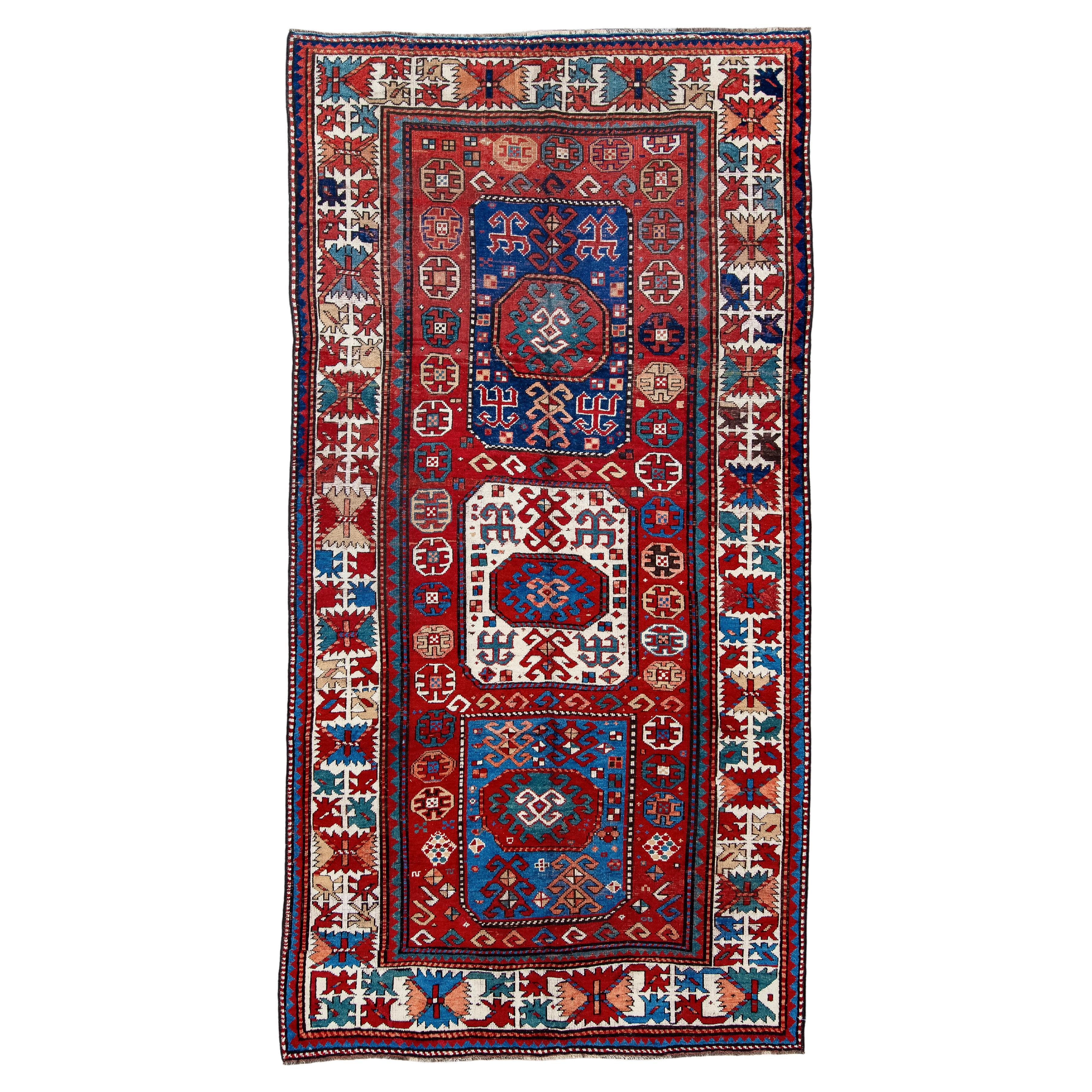 Kazak Rug Tribal Medallion and Hooked Motif Design For Sale