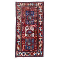 Kazak Rug Tribal Medallion and Hooked Motif Design