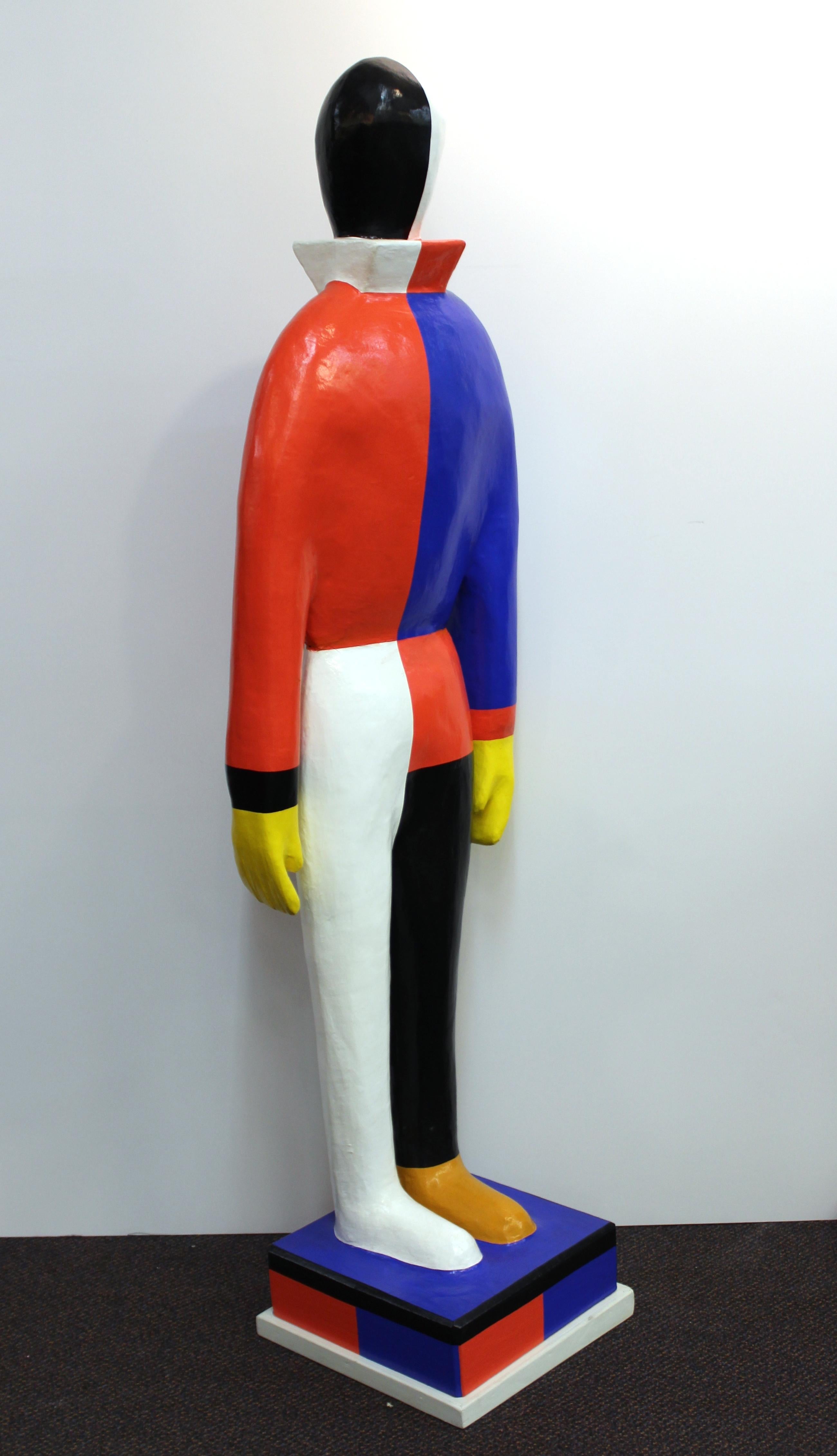 Modernist style statue inspired by the 1931 Suprematist 'Sportsmen' painting by Russian Modernist artist Kazimir Malevich, painted in a bold selection of colors. The statue was made during the 1990s and is in great condition with a small hairline