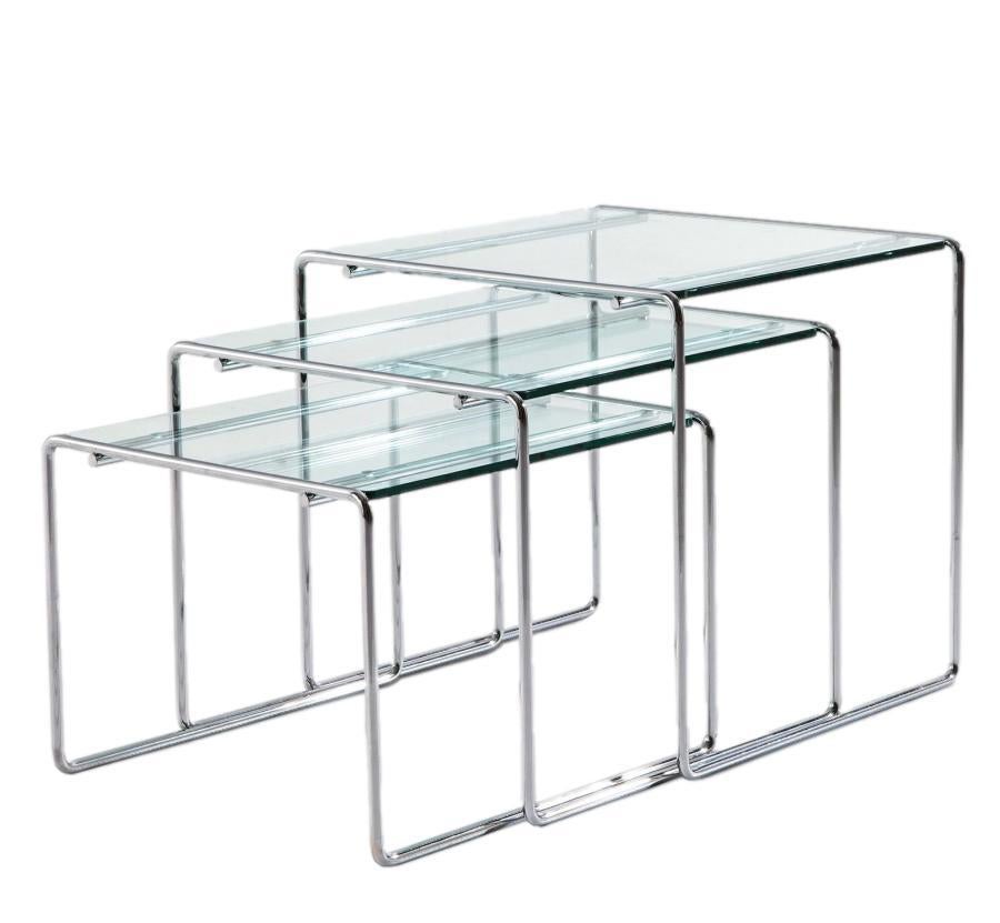 Marcel T stackable design side tables form a triptych of light, stackable forms made by applying chrome-plated steel rod, a distinctive material feature of many of Japanese master Takahama's designs.