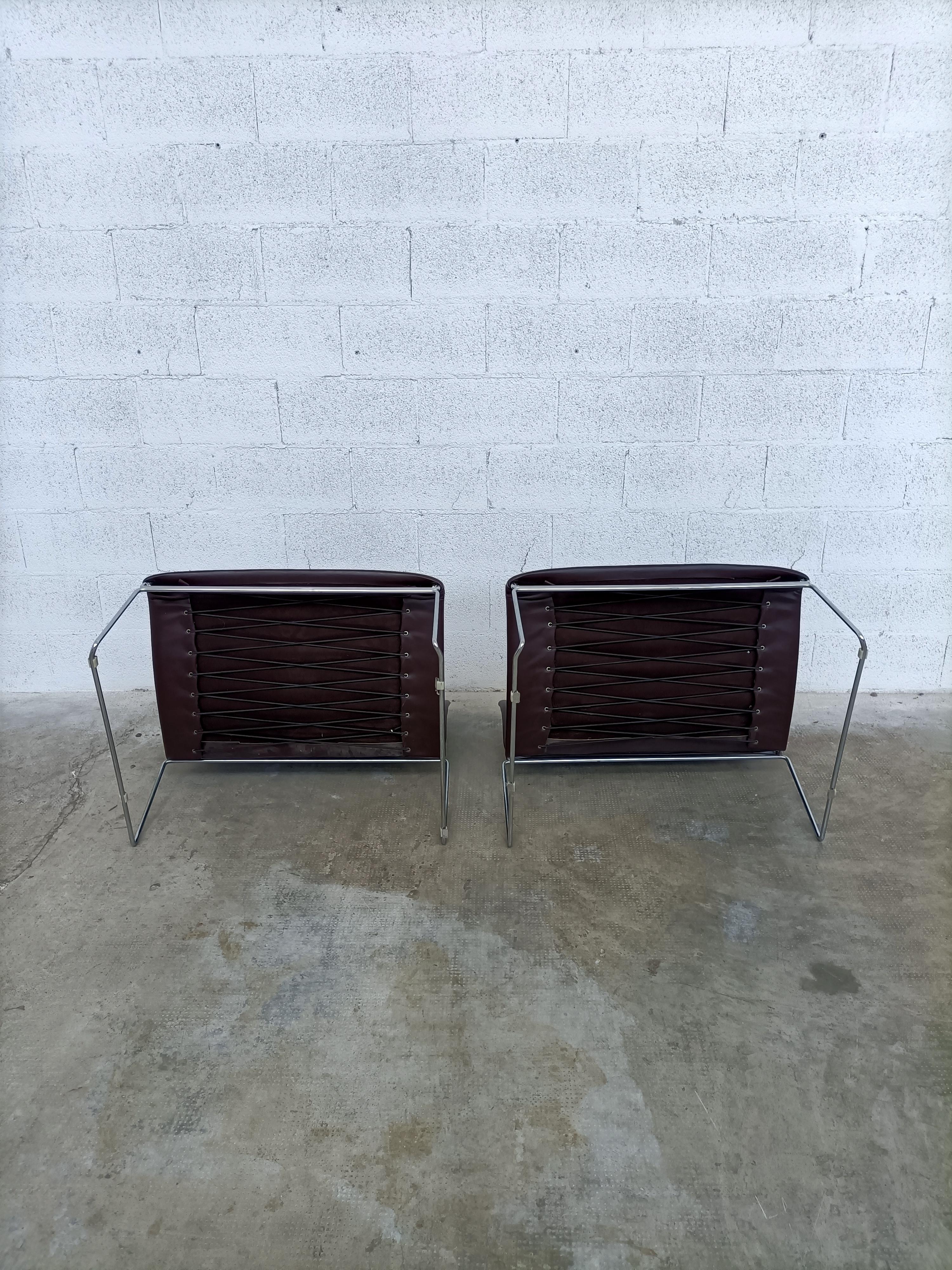 Set of 2;Saghi lounge chairs designed by Kazuhide Takahama for Simon Gavina in 1970s. 
The frames are made of solid bent steel chromed, upholstered in brown faux leather.
The 