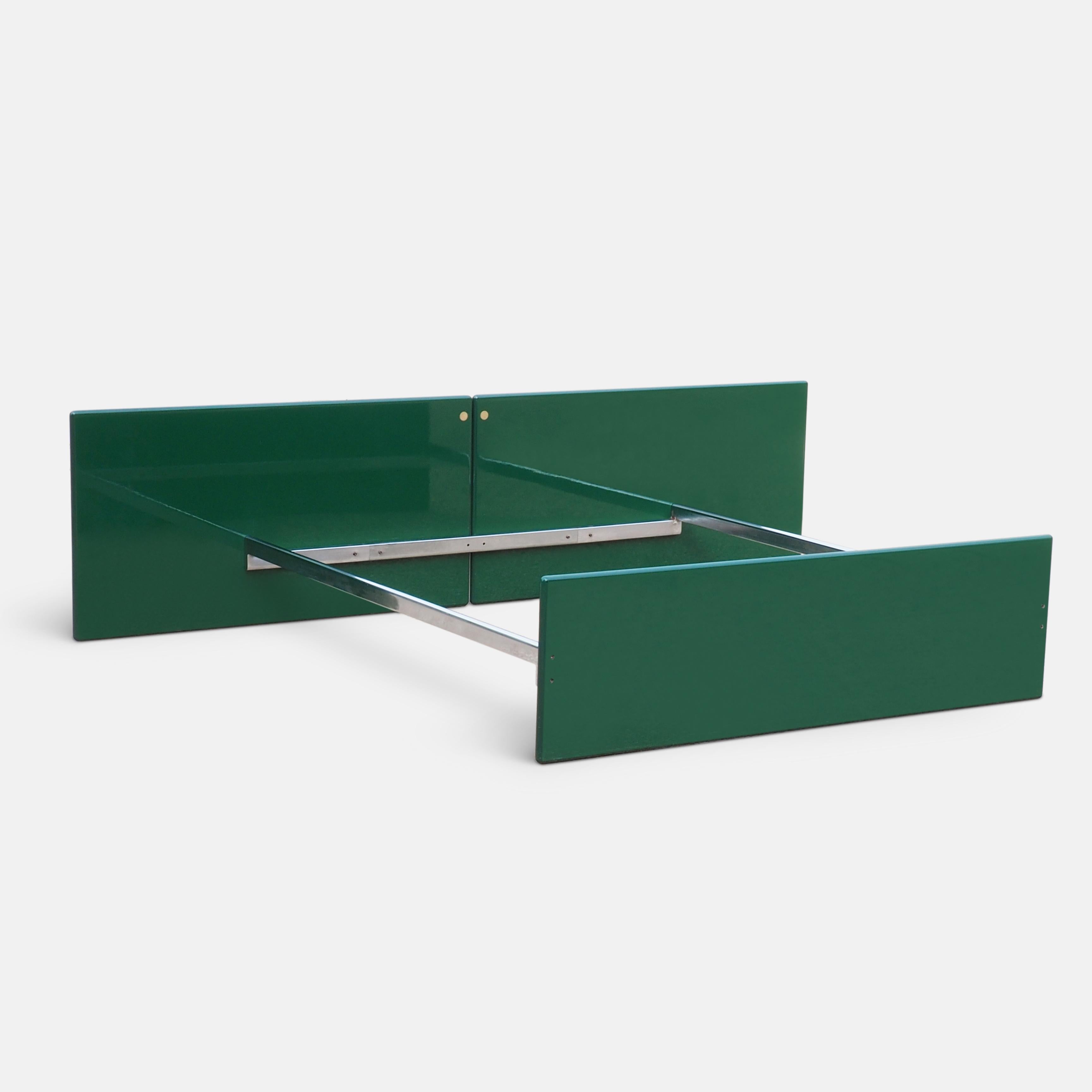 Green lacquered bed by Kazuhide Takahama for Dino Gavina's Studio Simon, Italy. Elegant bed of deep green lacquer panels and chrome metal rails finished with distinctive brass disc fittings. A sleek fusion of Japanese minimalism and Italian style.