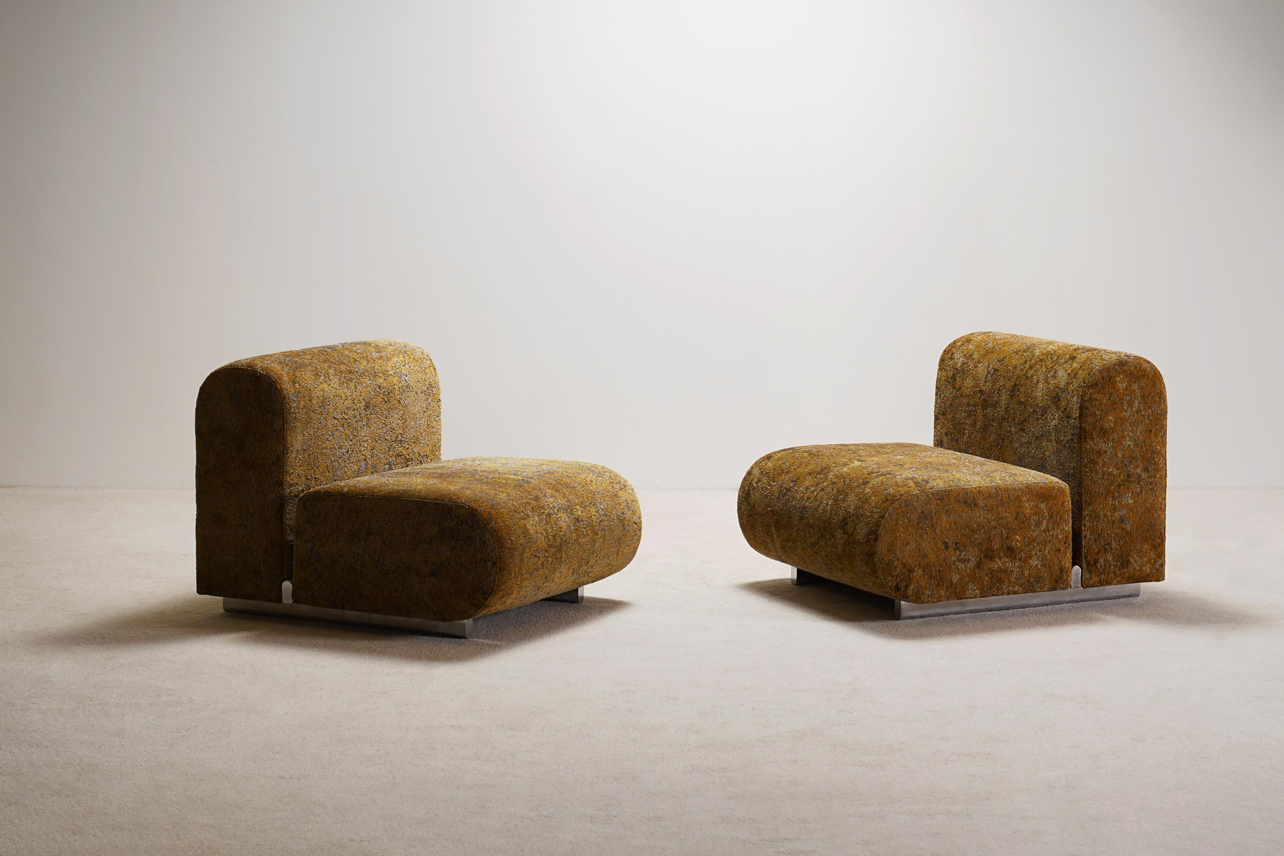 Rare and elegant pair of easy chairs model 