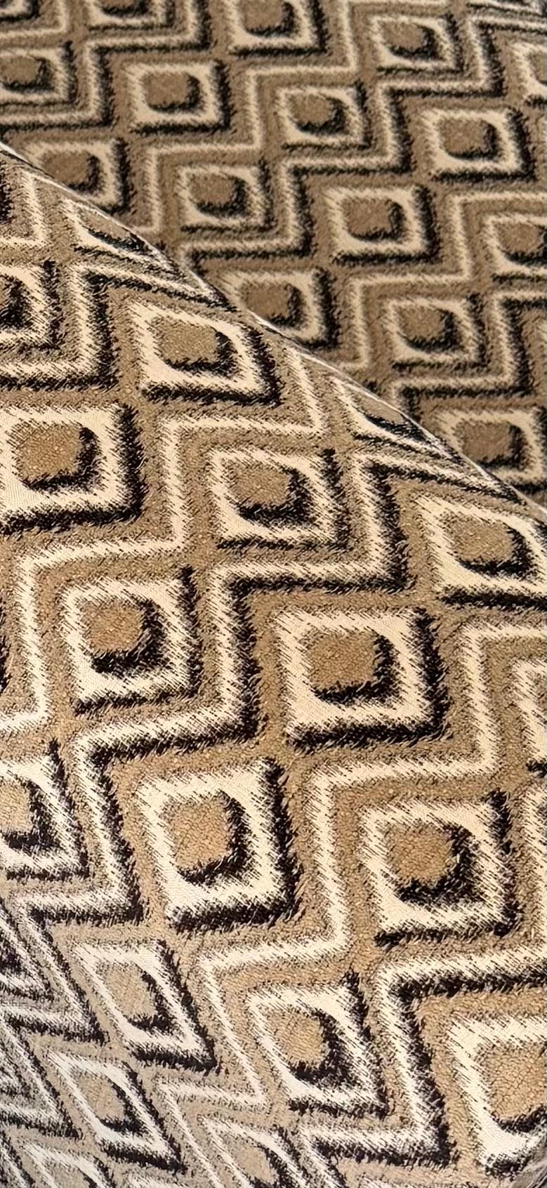 Design care of Kazuhide Takahama. Made by Knoll International. Sofa have been restored with new foam and reupholstered in a stunning geometric taupe, brown and black print. Chrome feet and accents are in good condition. Makers marks are present at