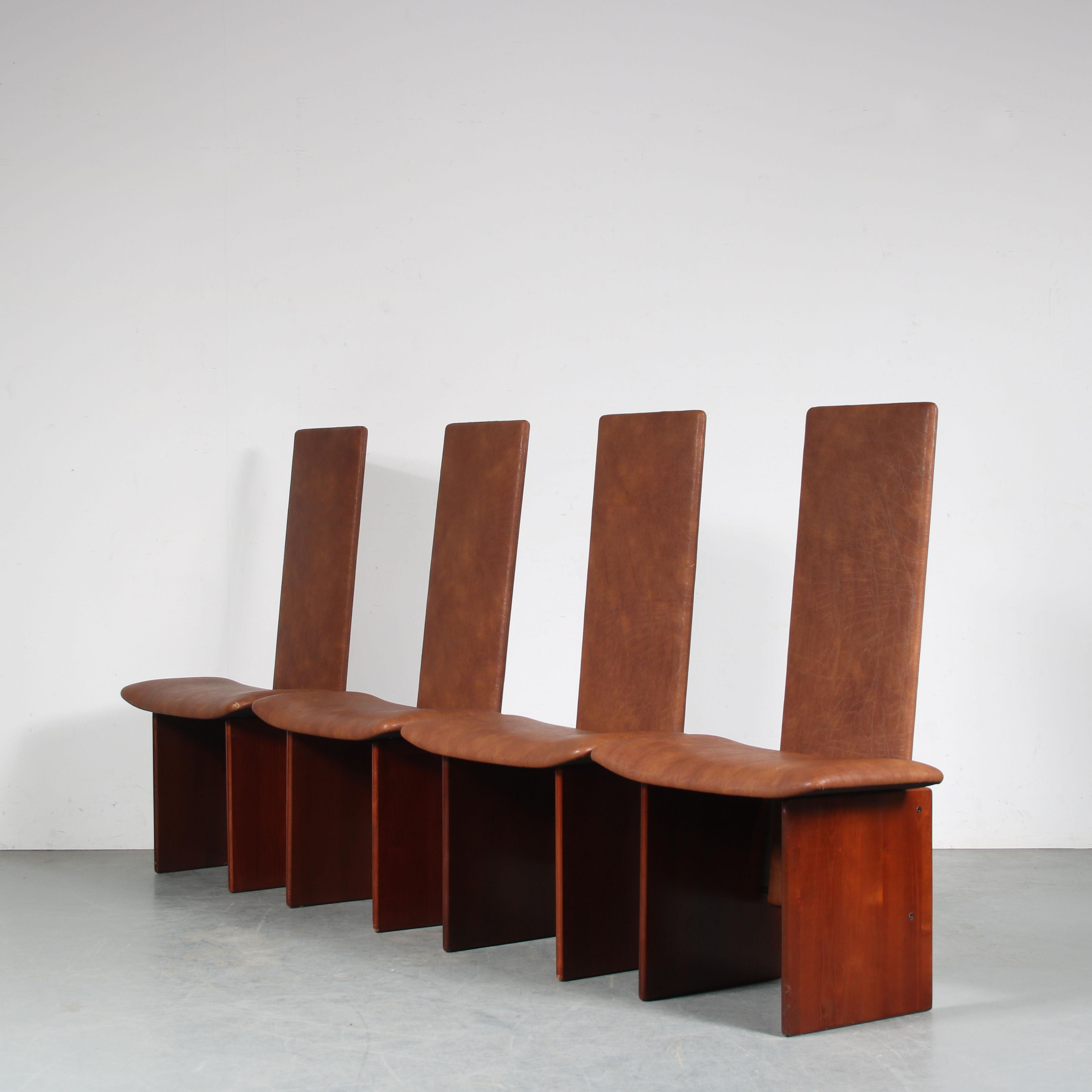 An impressive set of four dining chairs designed by Kazuhide Takahama, manufactured by Gavina in Italy around 1980.

The chairs, model “Kazuki”, are made of high quality brown wood. The seats and backs are upholstered in matching brown skai (faux