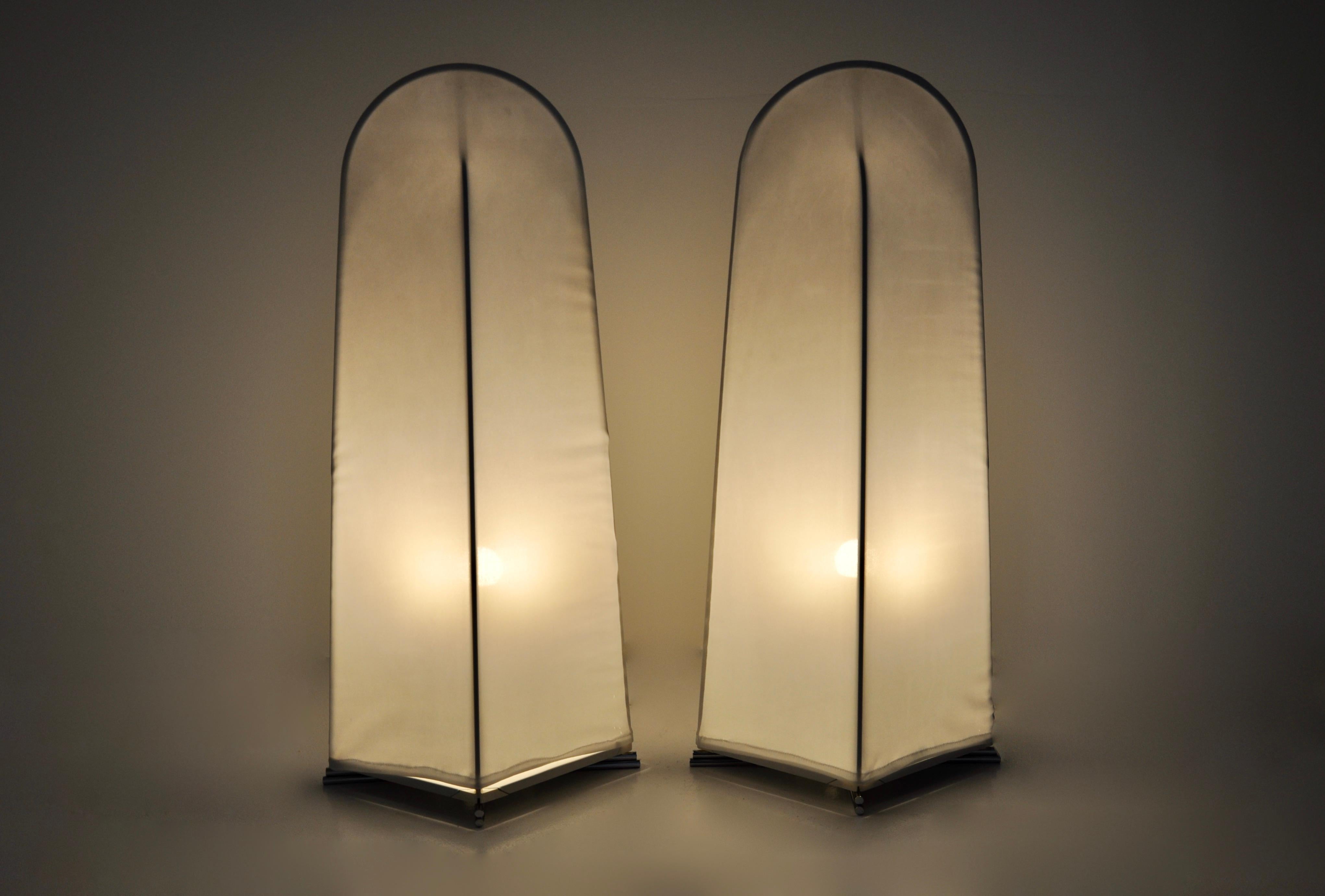 Set of 2 floor lamps by Kazuhide Tahama in fabric and metal. Model: Kazuki. Stamped on the underside. Wear due to time and age of the floor lamps.