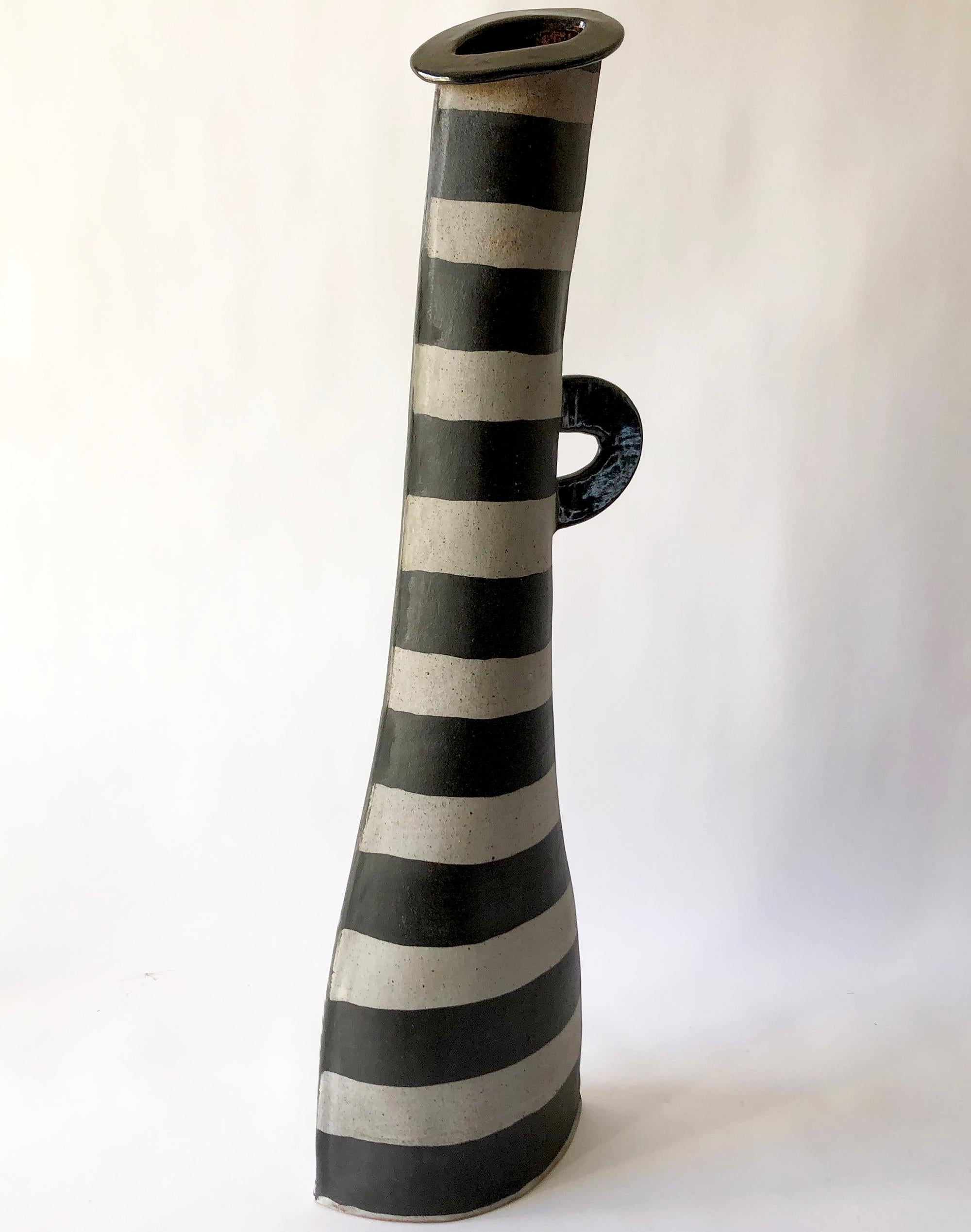 Flattened stoneware Post Modernist handled vase by California studio artist Kazuko Matthews. Vase measures 28
