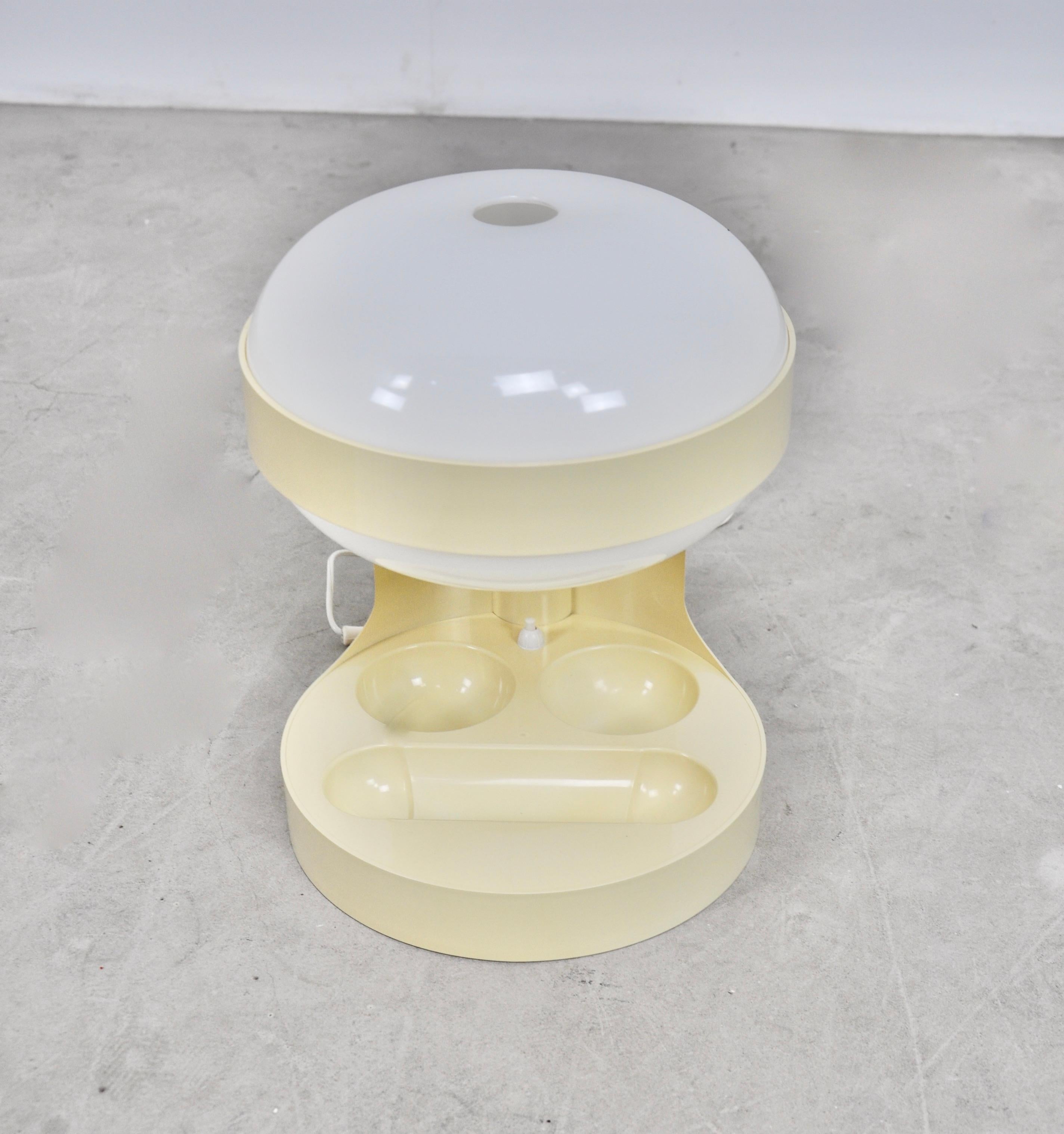 Plastic lamp of white color. Wear due to time and the age of the object (see photo).