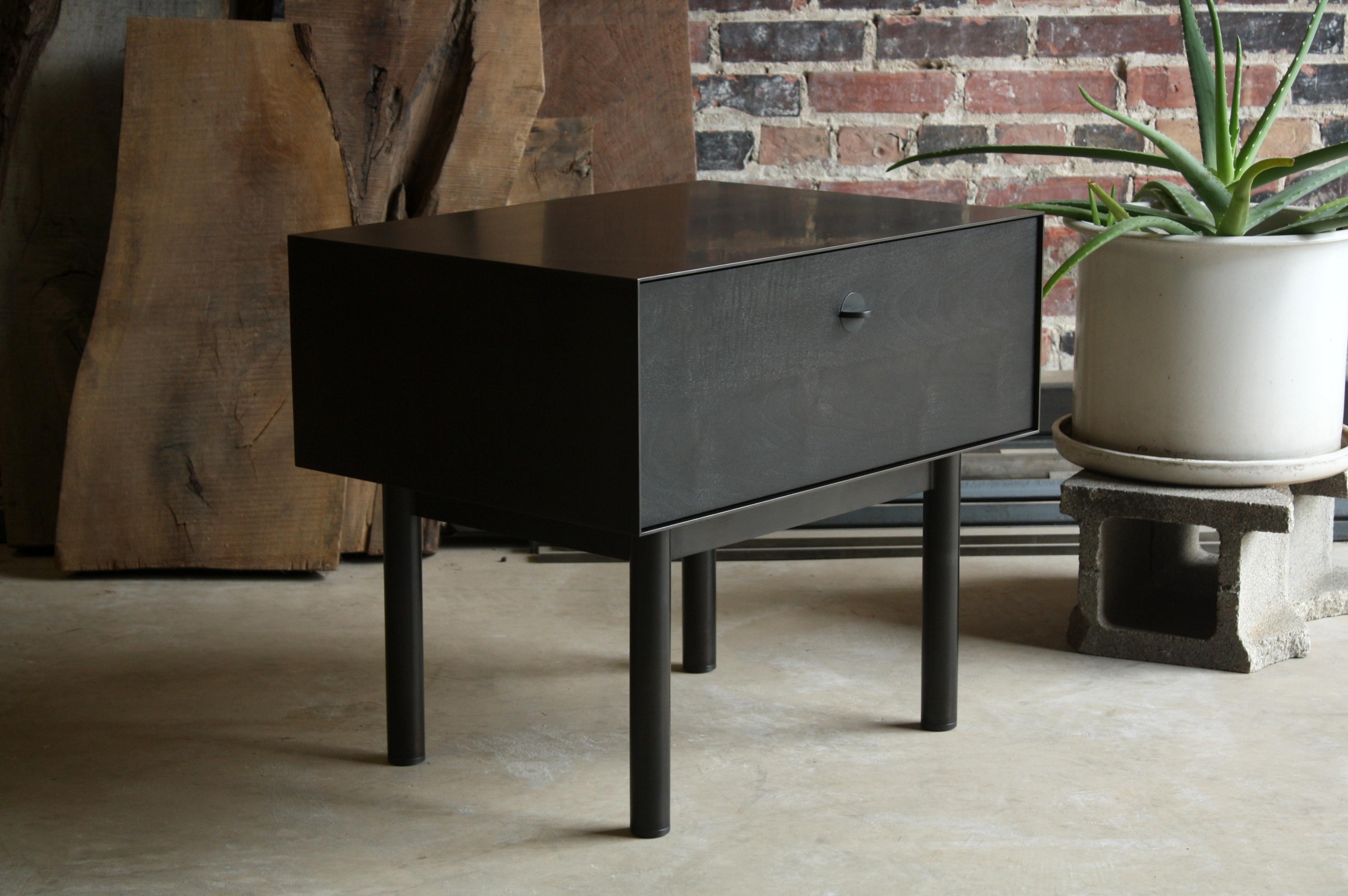 Shown in:
Blackened steel and ebonized walnut- 18