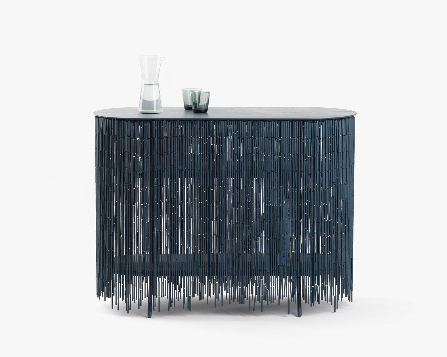 Keefer Credenza by Calen Knauf
Dimensions: D 46 x W 102 x H 76 cm
Materials: Steel, Ash Wood, Bamboo Beads
Also Available: Custom lengths and colours are possible, 

Keefer is a credenza that alludes to the objects stored within its shelves,