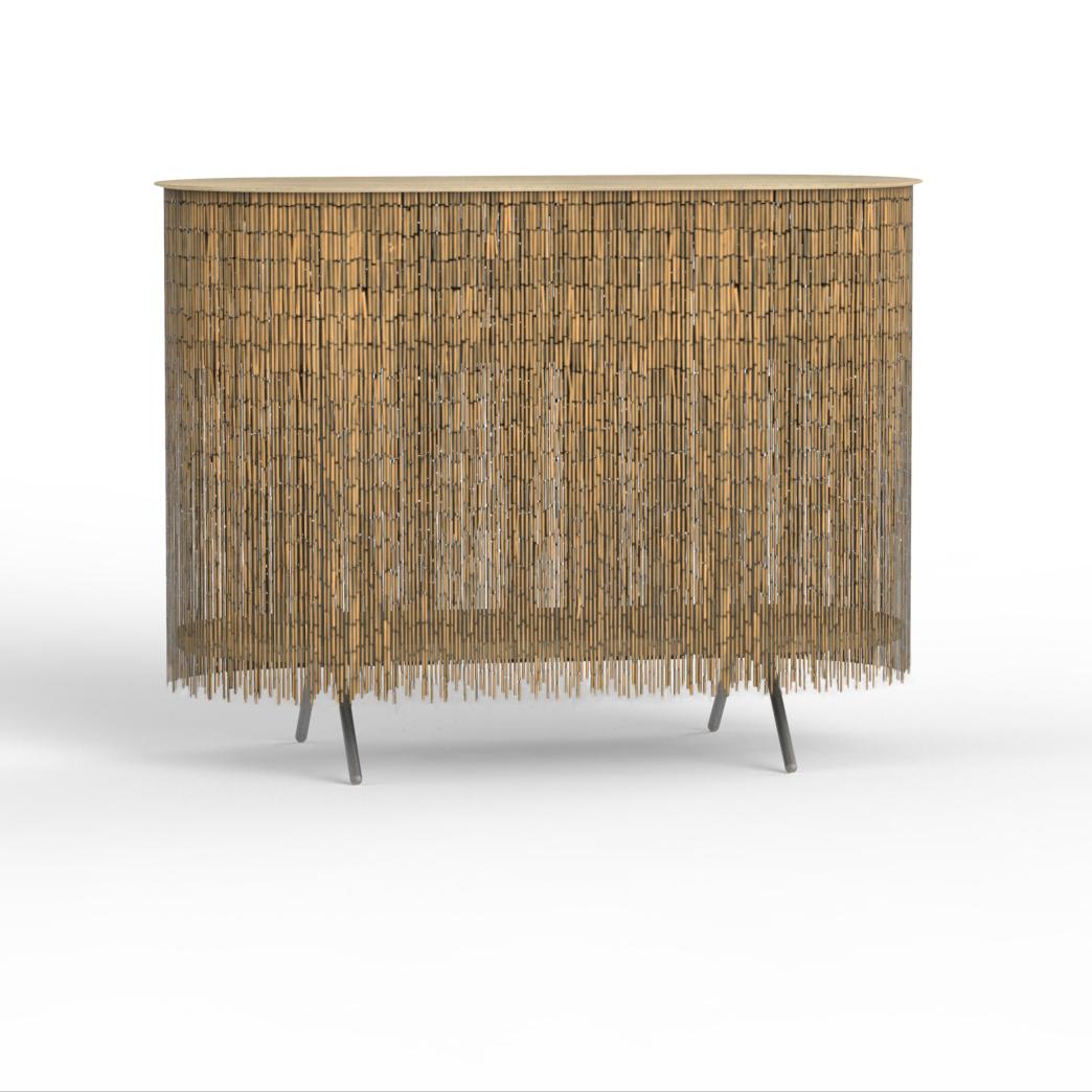 Keefer is a credenza that alludes to the objects stored within its shelves, yet obscures their identity through its bamboo-beaded skirt. The skirt masks the vertical supports, creating the allusion of floating shelves. The interior can be accessed