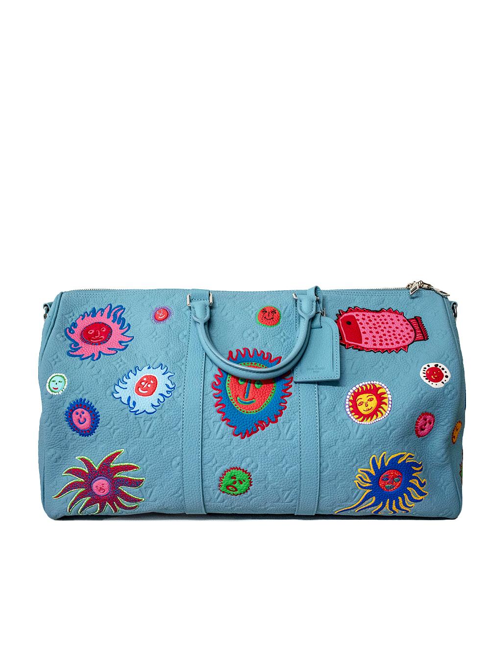 This Keepall 50, from the Louis Vuitton and Yayoi Kusama collaboration, is a highly coveted travel bag that is perfect for standing out. It is a favorite among collectors and comes with a full set. 

Made of light blue canvas with colourful