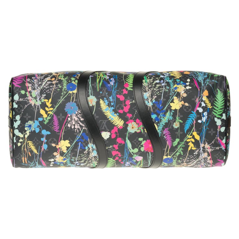 LVMenSS20 Florals and folds. Spring flowers adorn a Keepall and