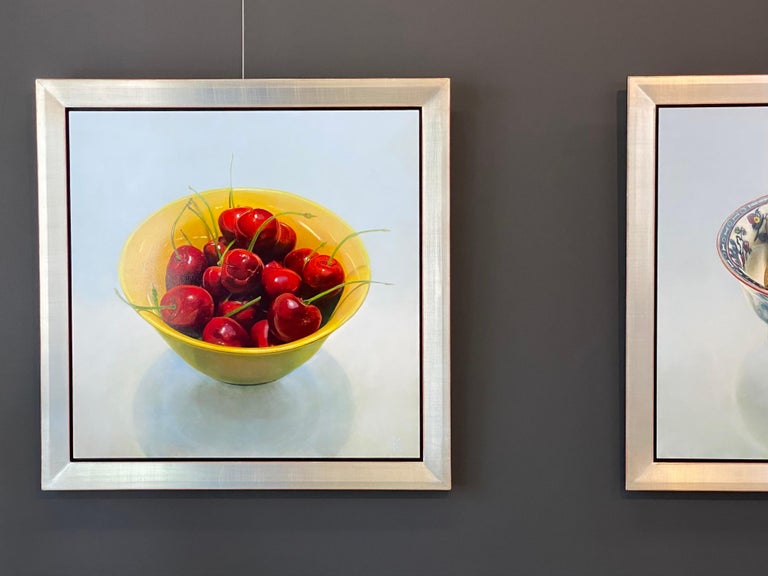 Yellow bowl with Red Cherries
90 x 90  cm  2022
Oil on panel 
The painting is framed in an handmade white gold gilded frame  105 x 105 cm 

This Hyper realistic painting is made by Kees Blom.  (2022)

The artist finds his inspiration in the still