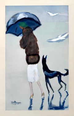 Woman with a dog on the Beach