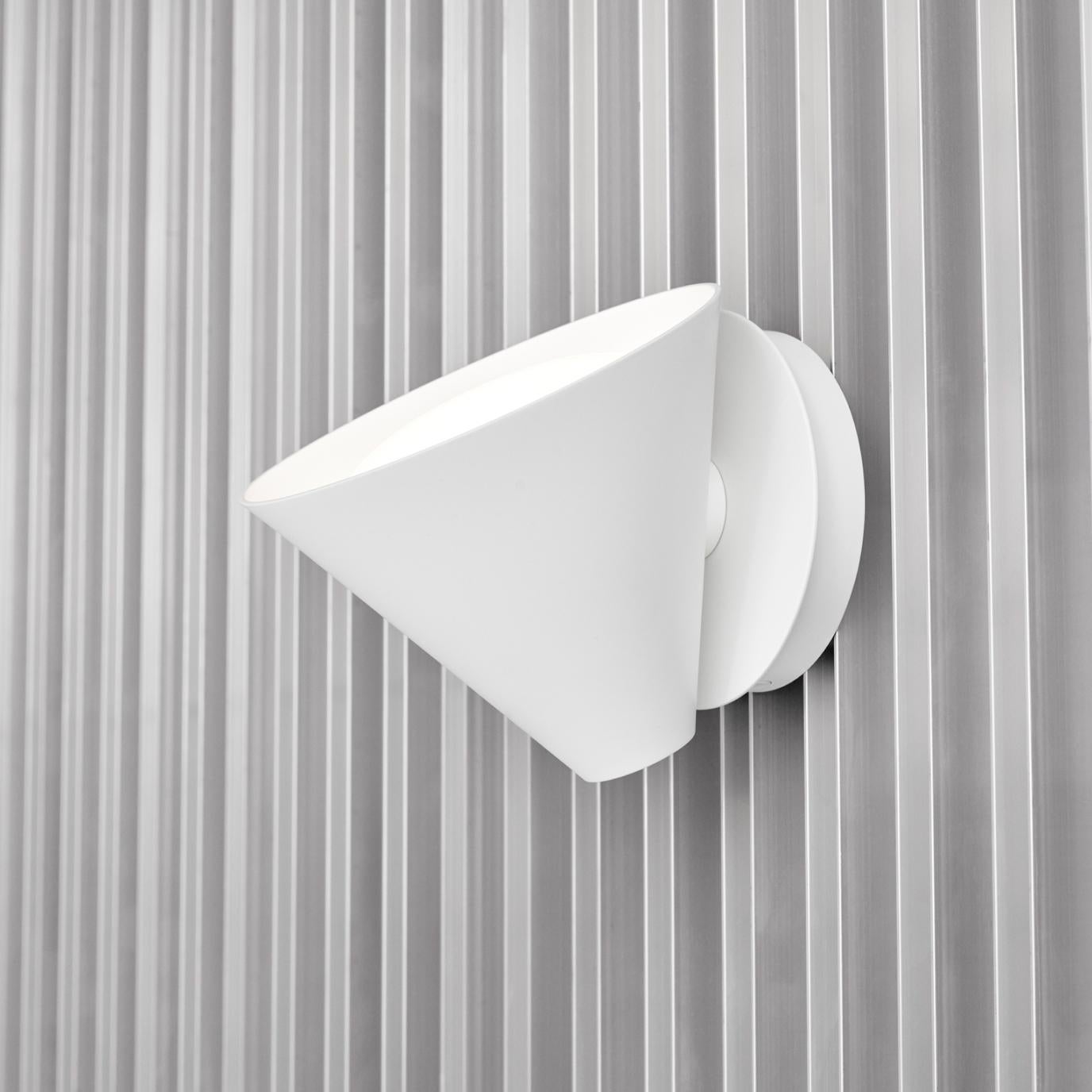 'Keglen' wall lamp for Louis Poulsen in White.

Keglen was created by Big Ideas in collaboration with Louis Poulsen in 2017. 
Bjarke Ingels, Jakob Lange and the design team from Big Ideas wanted to create a family of lamps with the same qualities