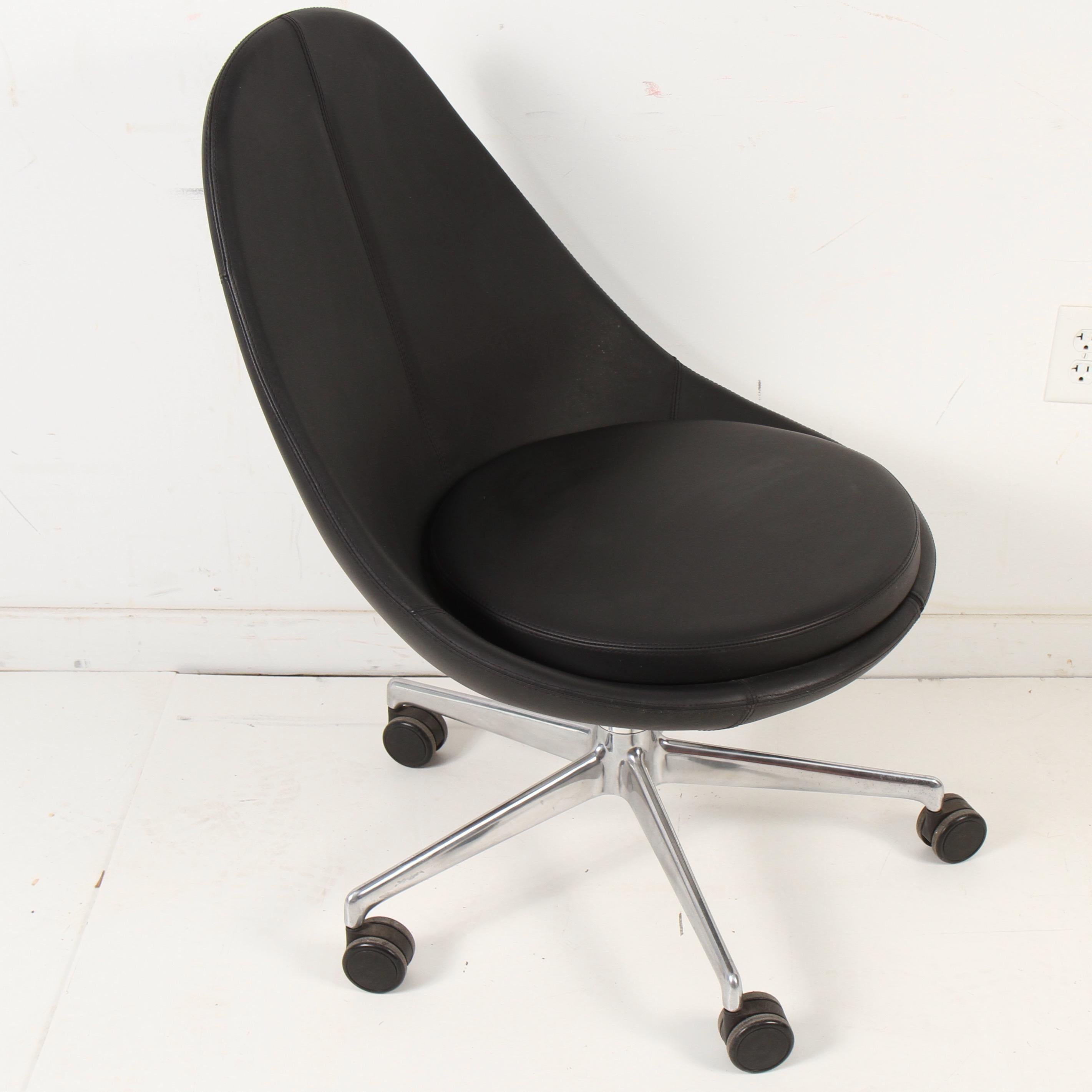 Very clean, very cool, very comfortable desk chair on castors by Canadian furniture maker Keilhauer.