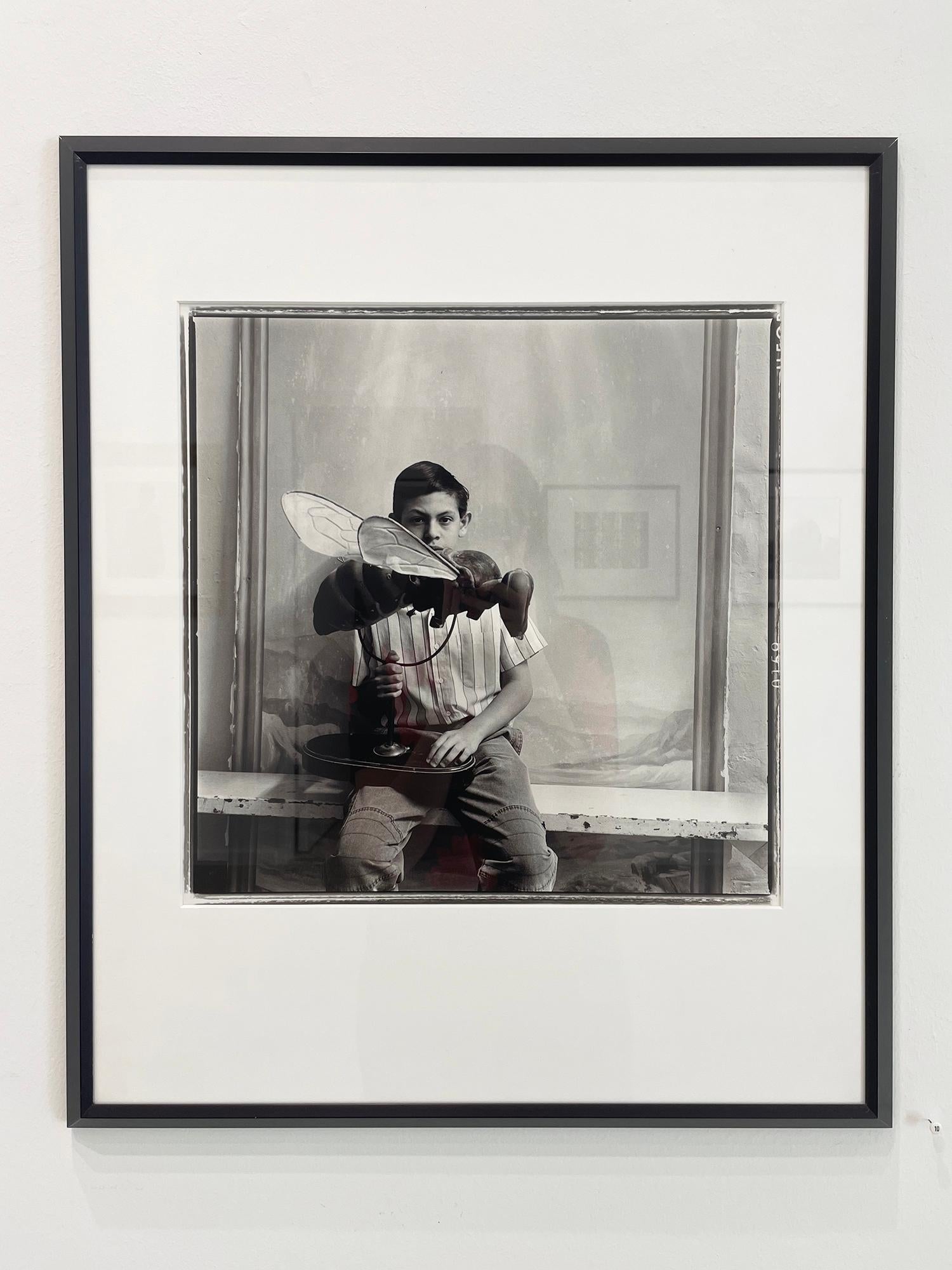 Boy with Bee - Photograph by Keith Carter b.1948