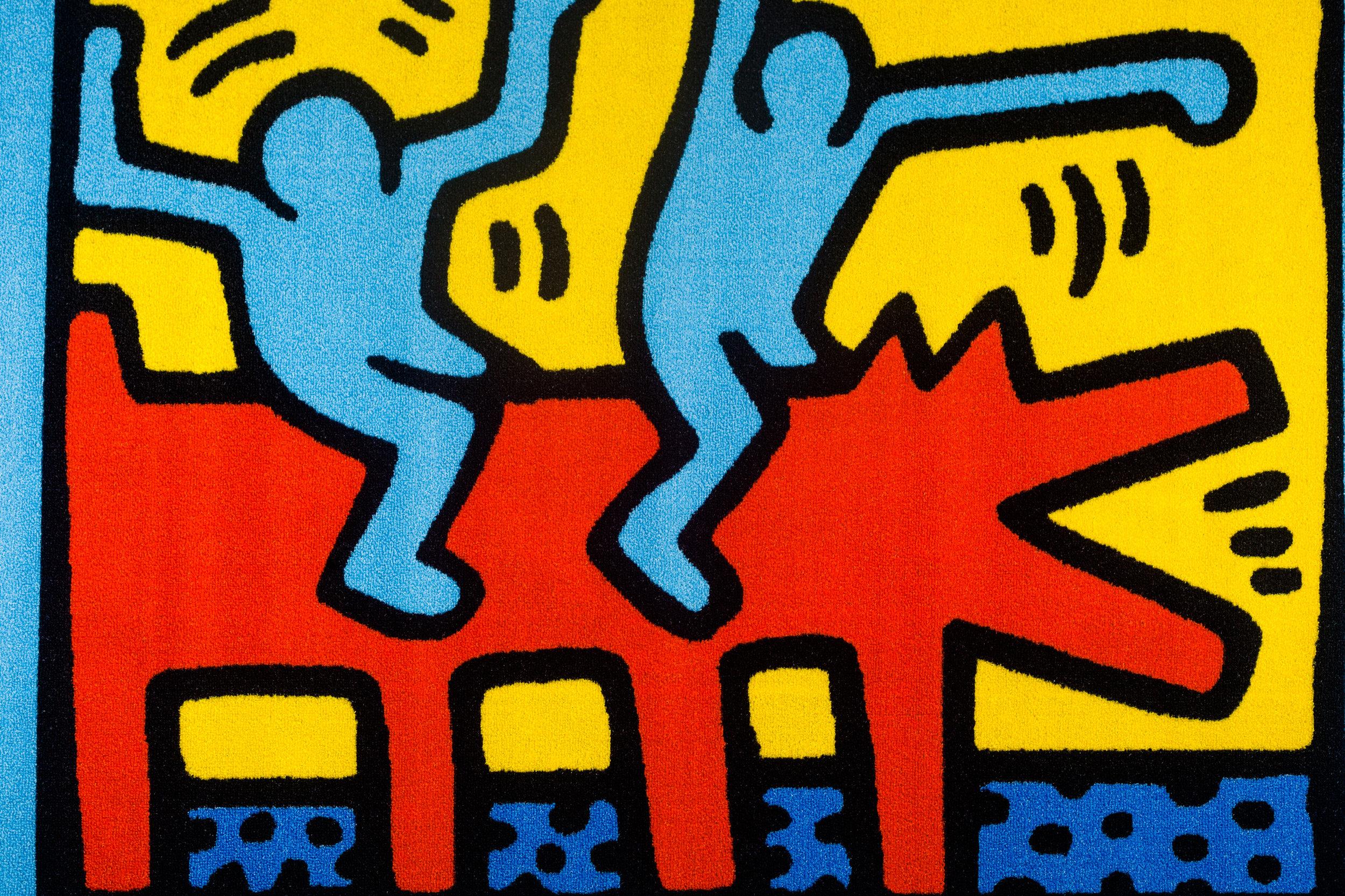 Keith Haring rug with two dancing figures on a dog, distributed by Comart Italia. Copyright Keith Haring Foundation, licensed by Artestar, New York. New old stock, in packaging. For anyone who admires the work of Keith Haring.

Year: