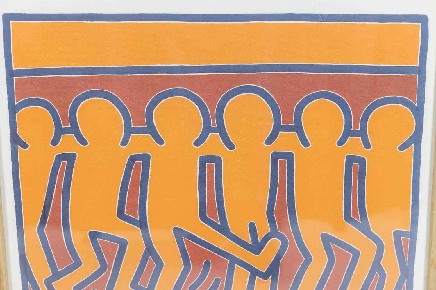 Keith Haring, signed and numbered.

Lithography representing schematic characters, in shades of orange, red and blue, in its blond oak frame.

Numbered 16/150.

American work realized in the 1990s.