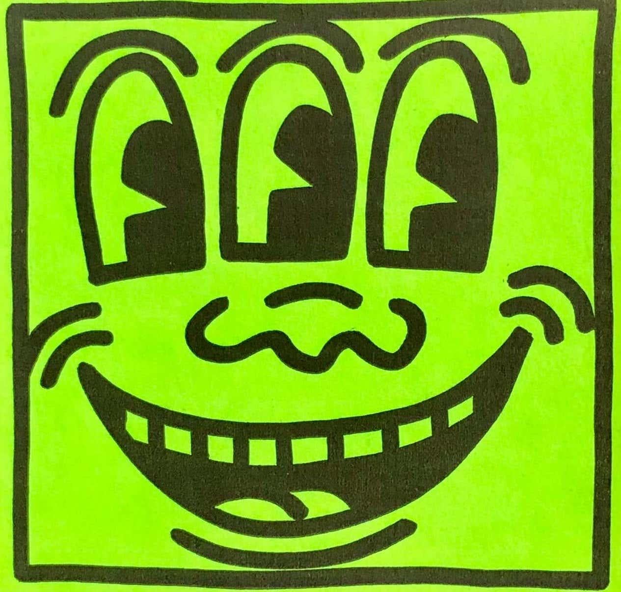 Keith Haring Three Eyed Smiling sticker c. 1982: A timeless Keith Haring collectible originally given out at Haring's first solo exhibit in 1982; and later sold at Haring's Pop Shop circa mid 1980s. 

Vintage Pop Shop sticker featuring original