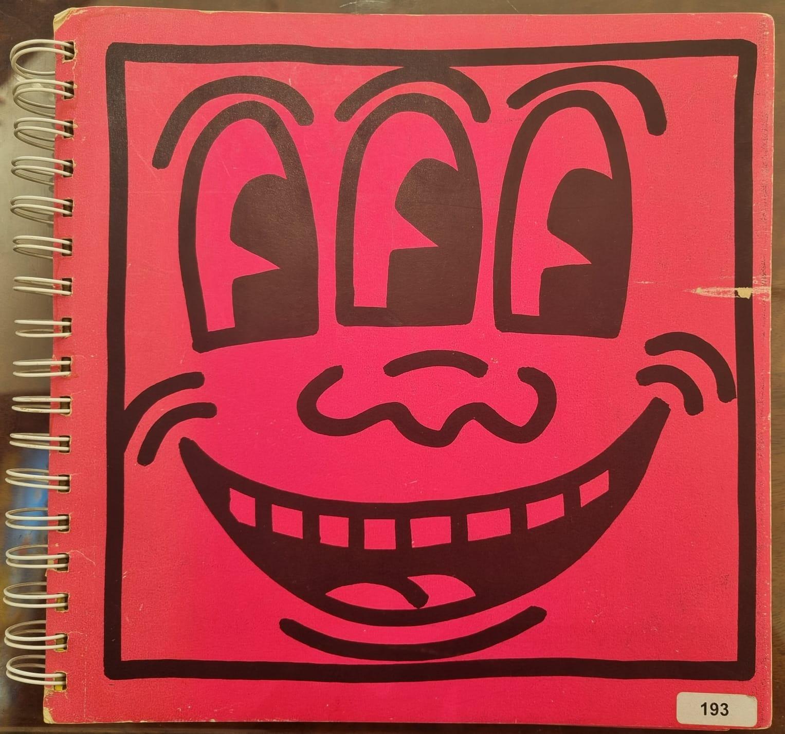 Signed artist catalog with a drawing - Pop Art Mixed Media Art by Keith Haring