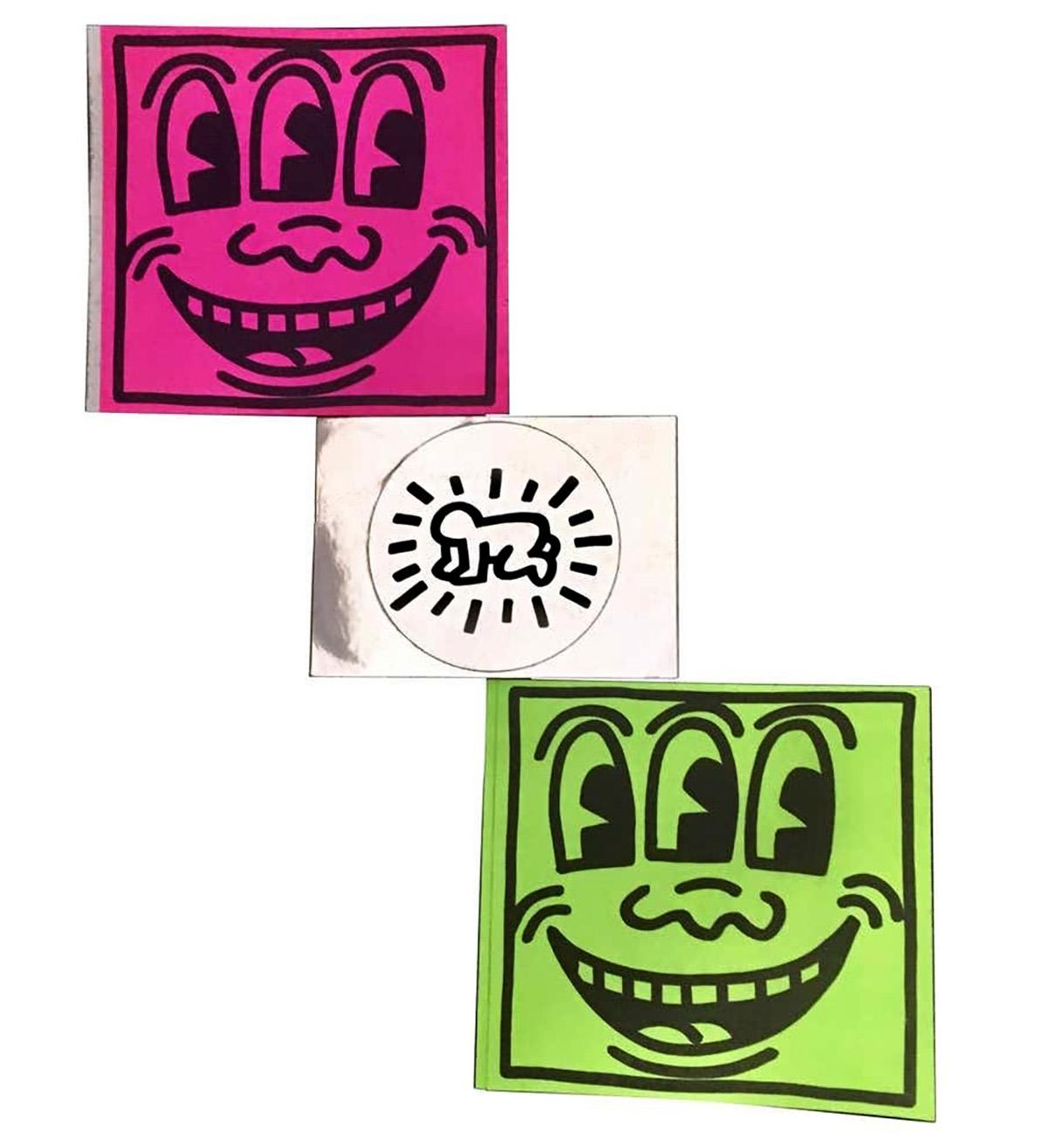 Keith Haring Crawling Baby & Three Eyed Smiling Face stickers circa early/ mid 80s.

Originally produced by Haring for his first solo gallery exhibition in 1982, then later sold/given out at Haring's New York Pop Shop throughout the 1980s. Iconic