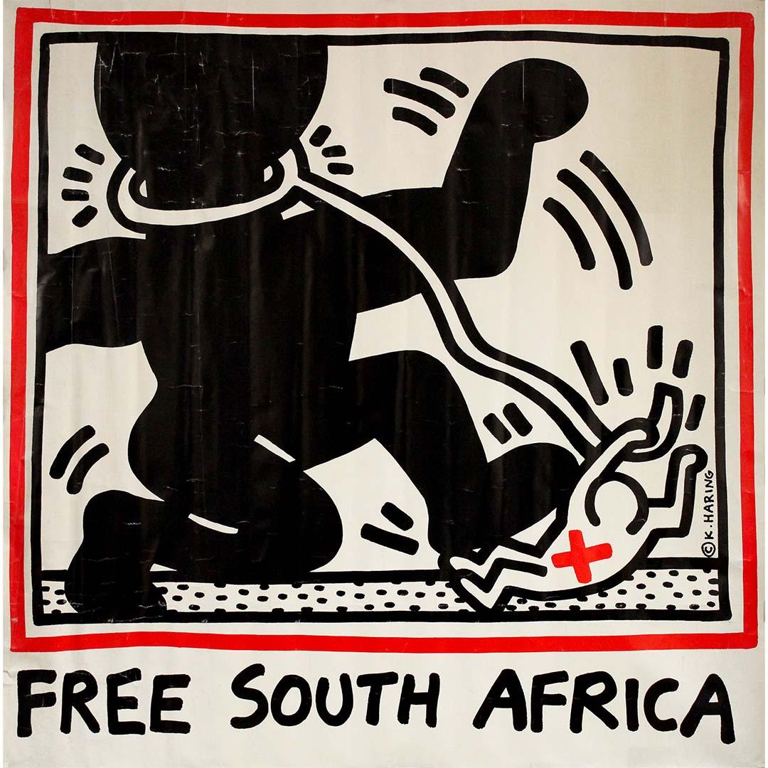 A powerful piece of visual activism, this 1985 original poster by renowned American artist Keith Haring, titled "Free South Africa", captures the urgency and moral clarity of the global fight against apartheid. Using his instantly recognizable